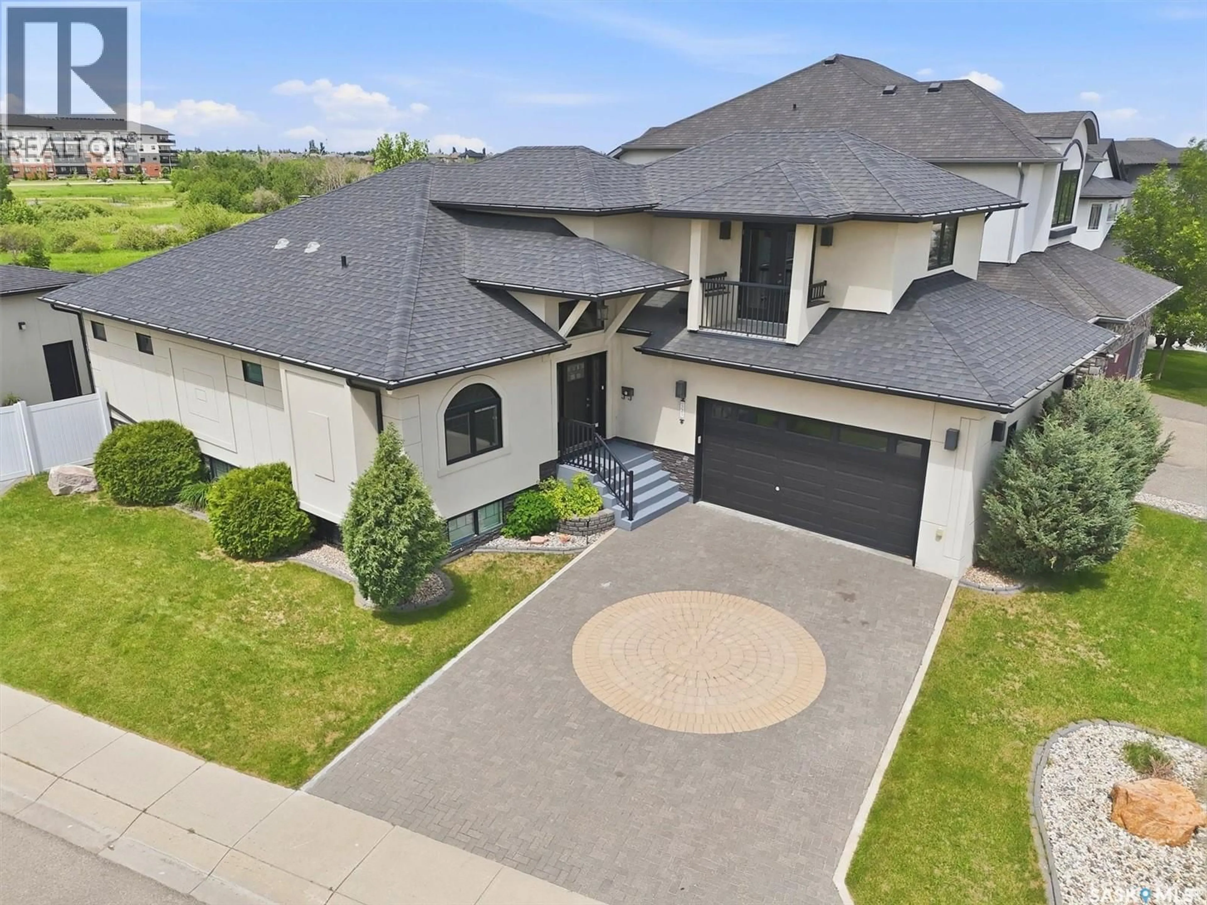 A pic from outside/outdoor area/front of a property/back of a property/a pic from drone, street for 327 HASTINGS LANE, Saskatoon Saskatchewan S7V0C8