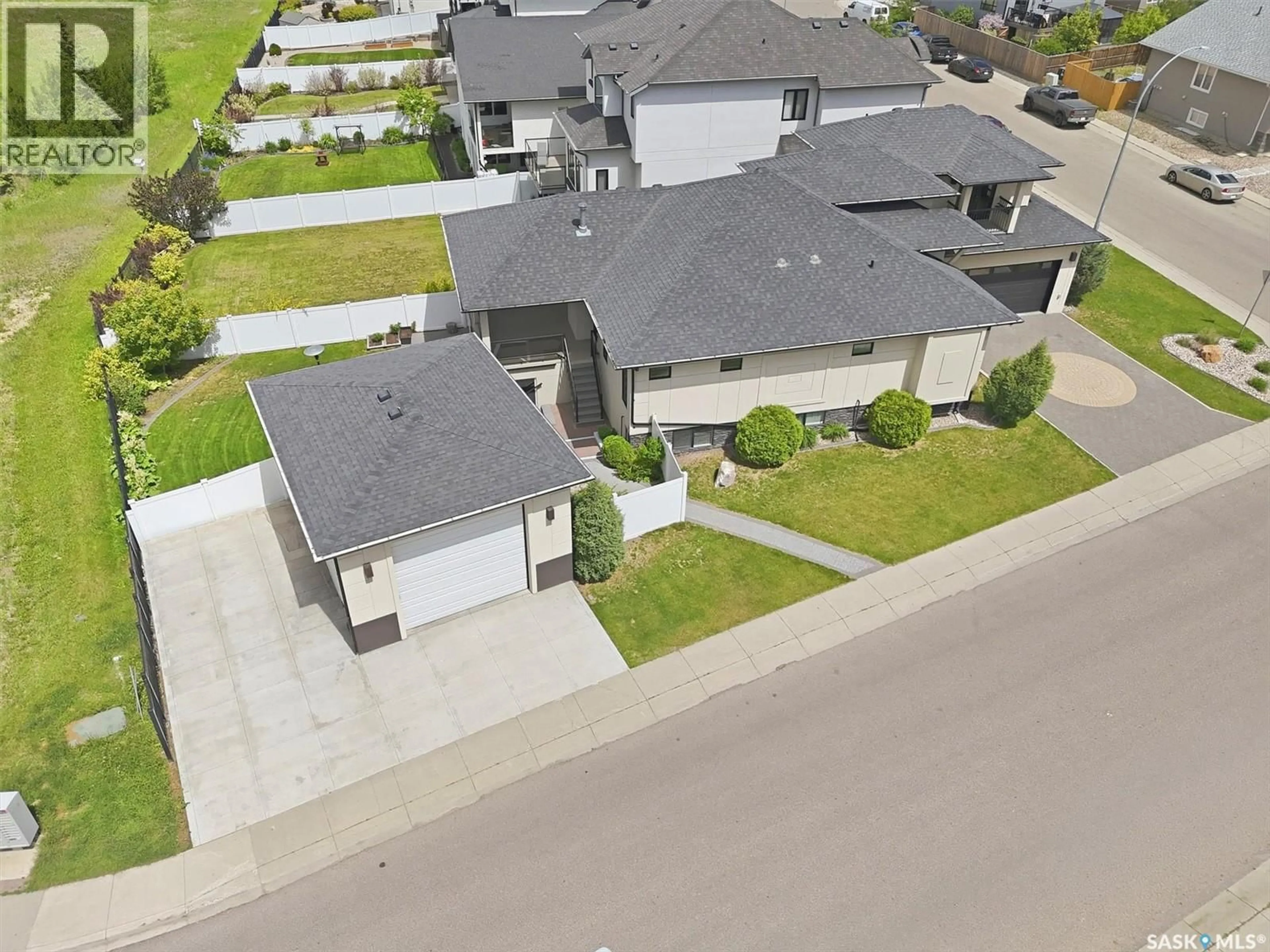 A pic from outside/outdoor area/front of a property/back of a property/a pic from drone, street for 327 HASTINGS LANE, Saskatoon Saskatchewan S7V0C8
