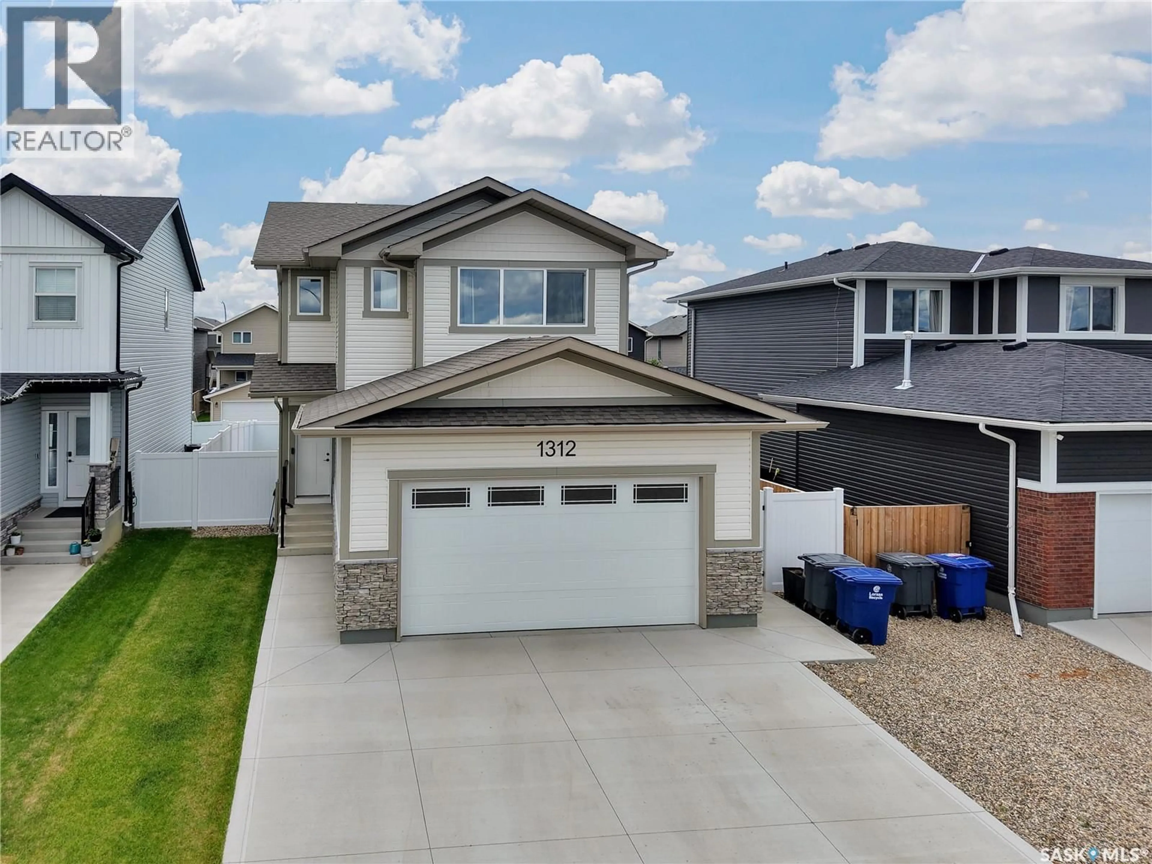 Home with vinyl exterior material, street for 1312 PARR HILL DRIVE, Martensville Saskatchewan S0K2T1