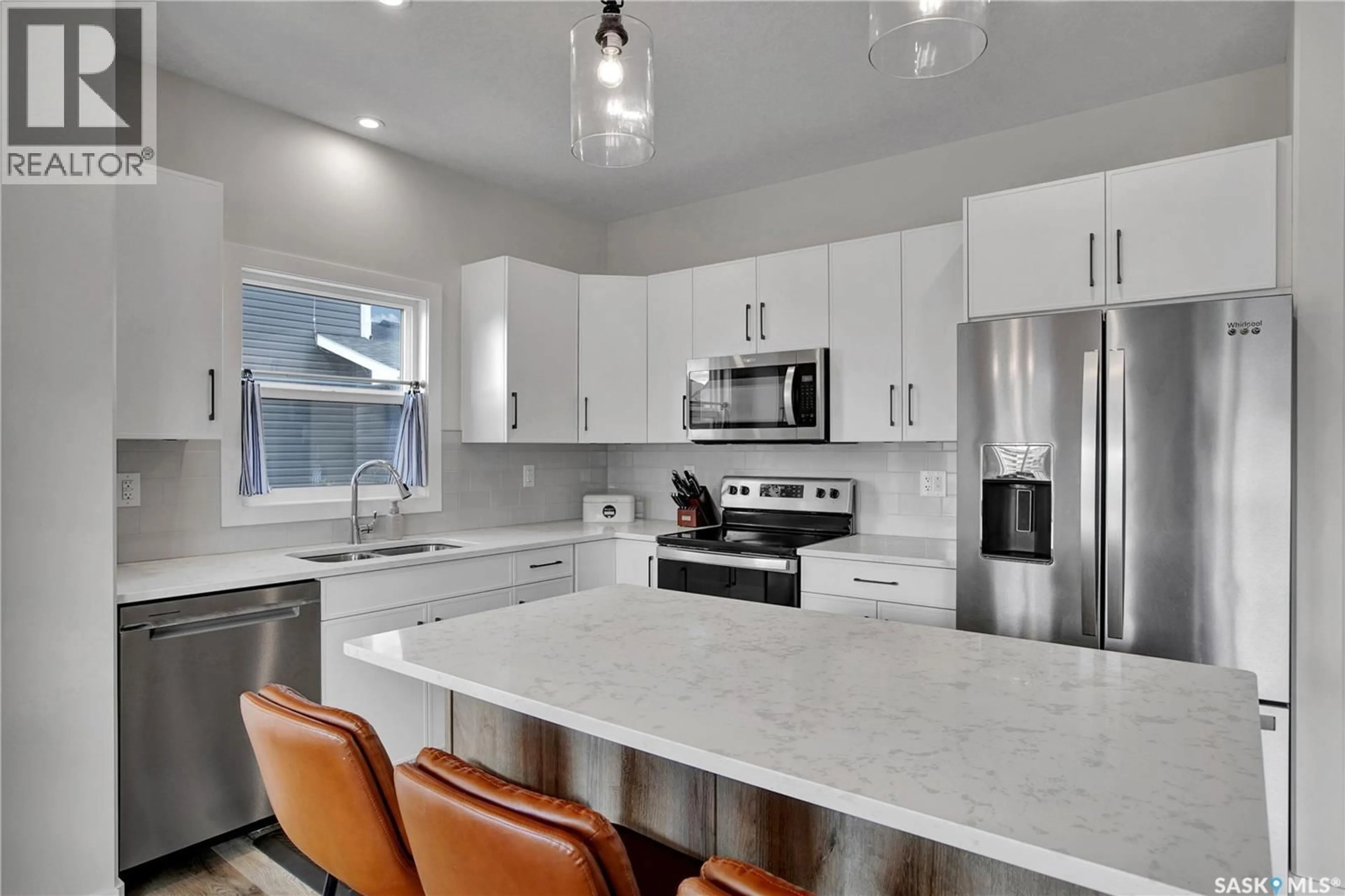 Open concept kitchen, ceramic/tile floor for 1312 PARR HILL DRIVE, Martensville Saskatchewan S0K2T1