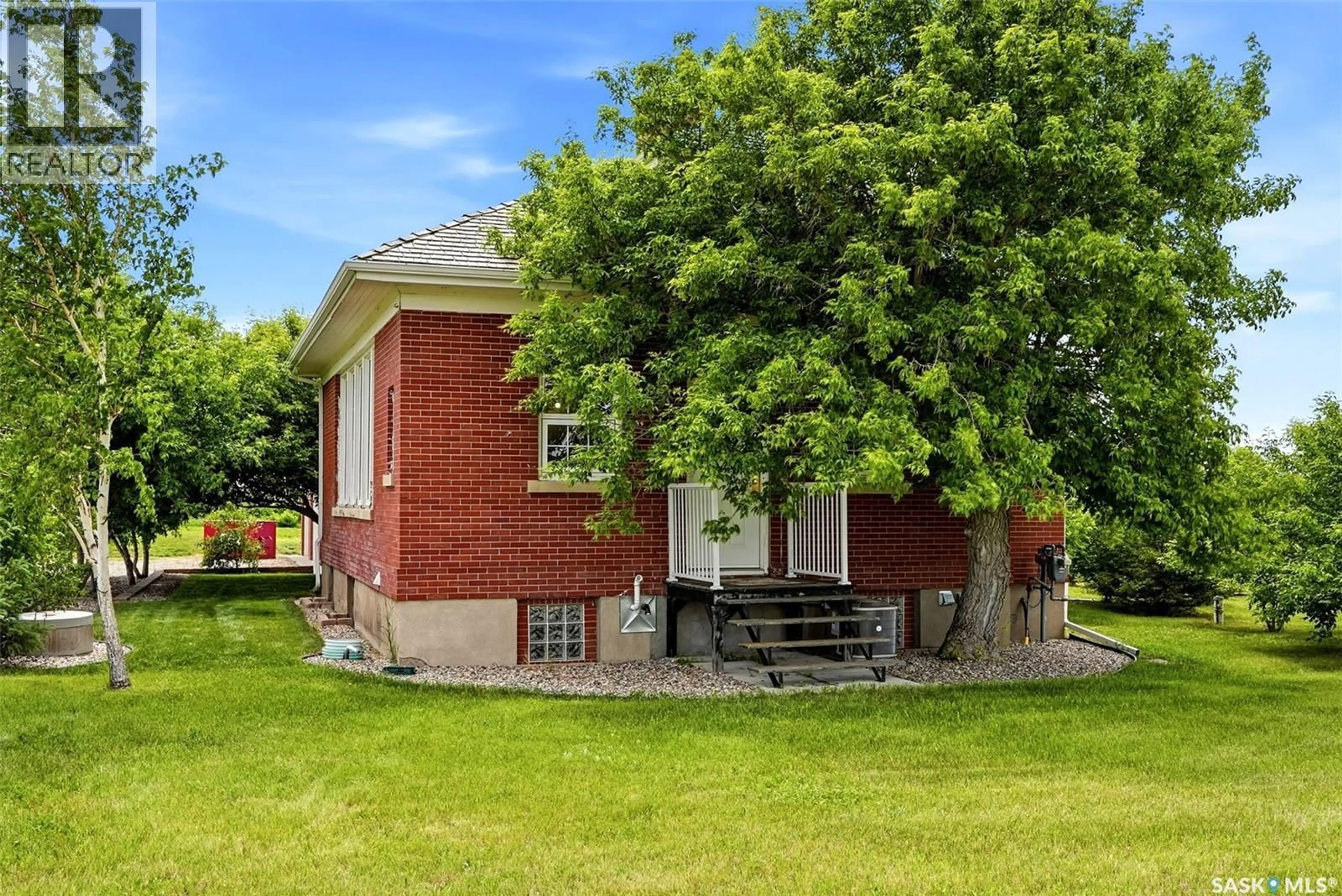 Home with brick exterior material, street for Boggy Creek SCHOOL ACREAGE, Sherwood Rm No. 159 Saskatchewan S4P2Z2