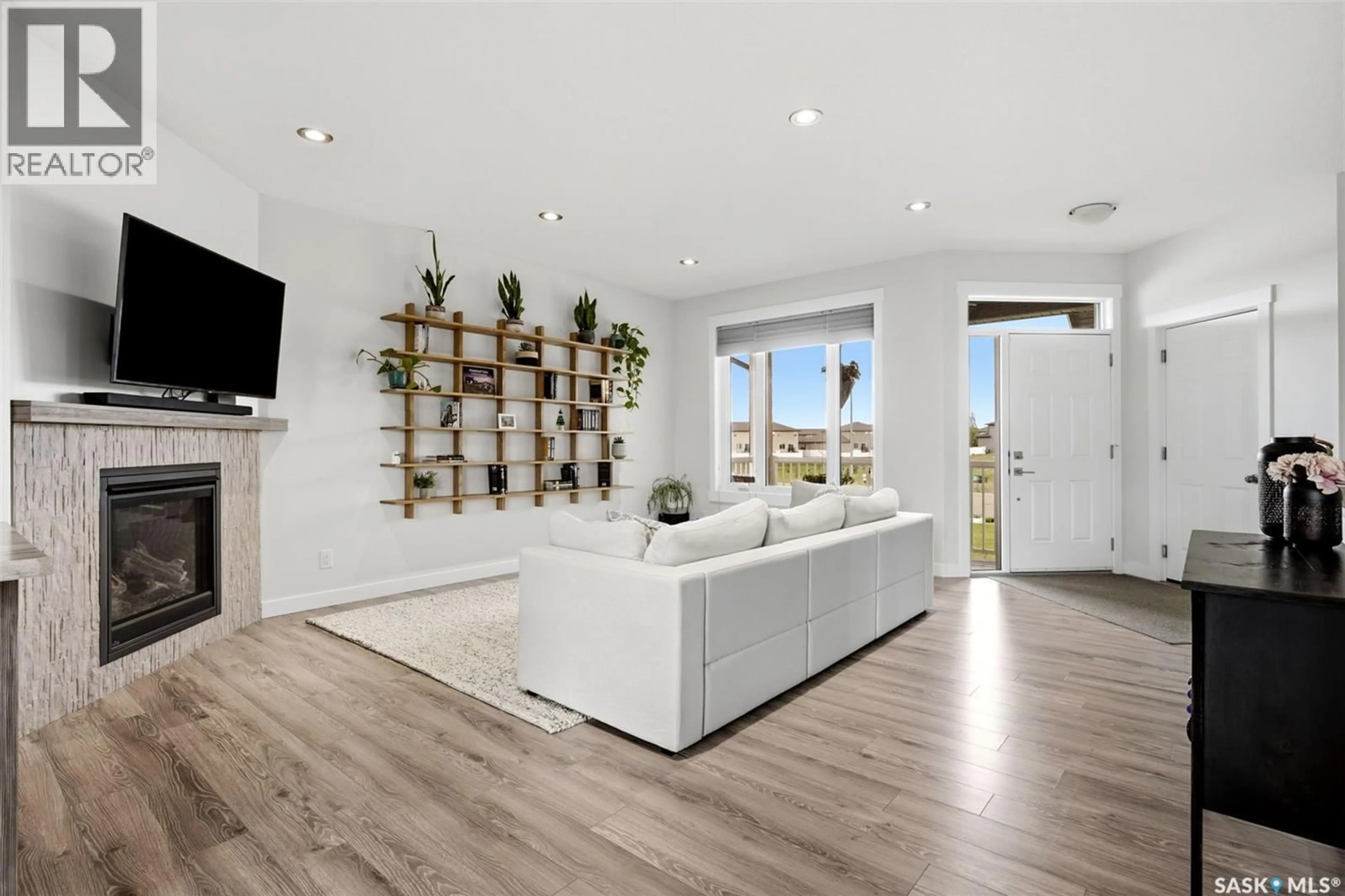 Living room with furniture, unknown for 3 PLAINS WAY, Pilot Butte Saskatchewan S0G3Z0