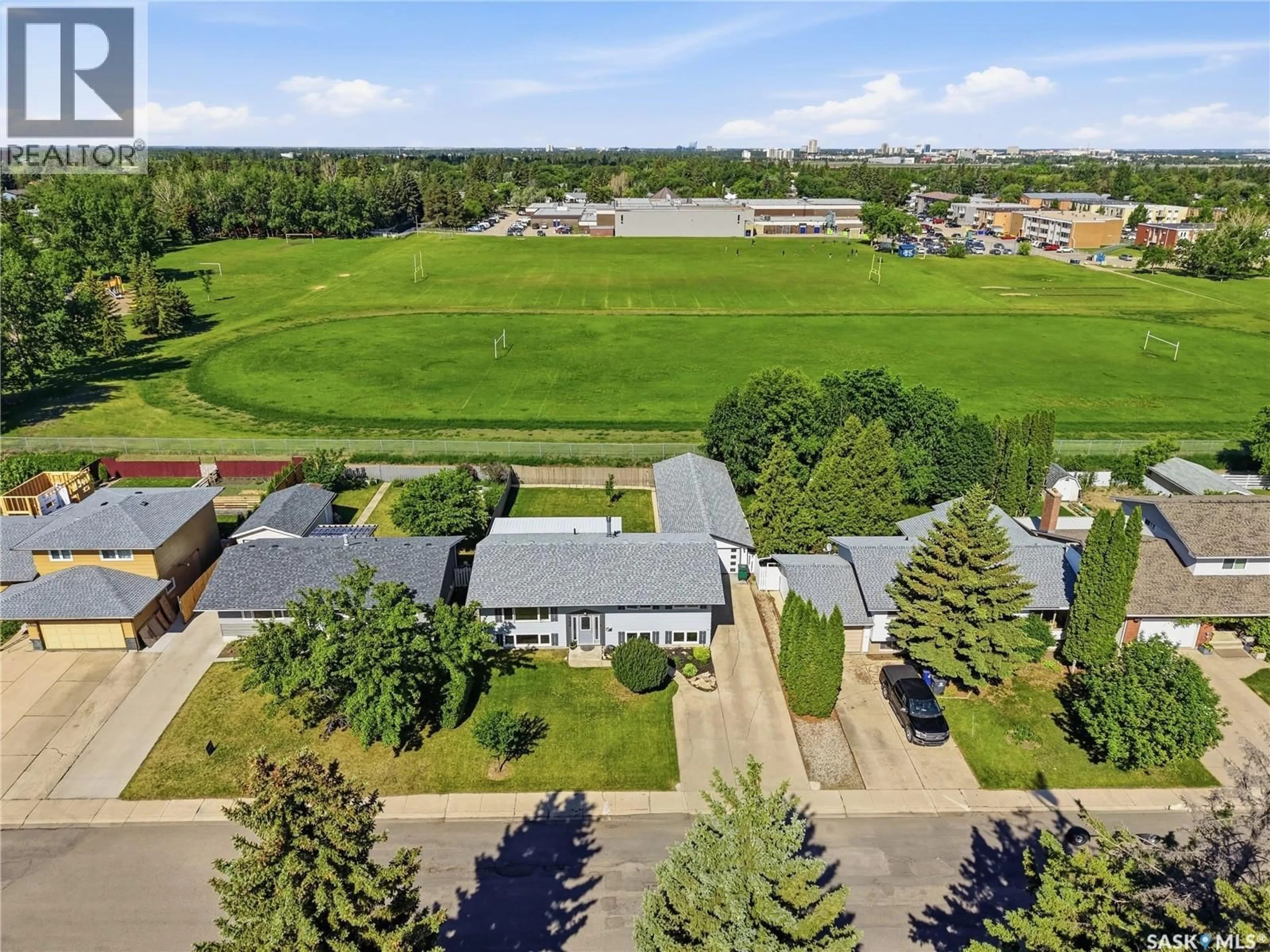 A pic from outside/outdoor area/front of a property/back of a property/a pic from drone, unknown for 154 MOUNT ALLISON CRESCENT, Saskatoon Saskatchewan S7H4A5