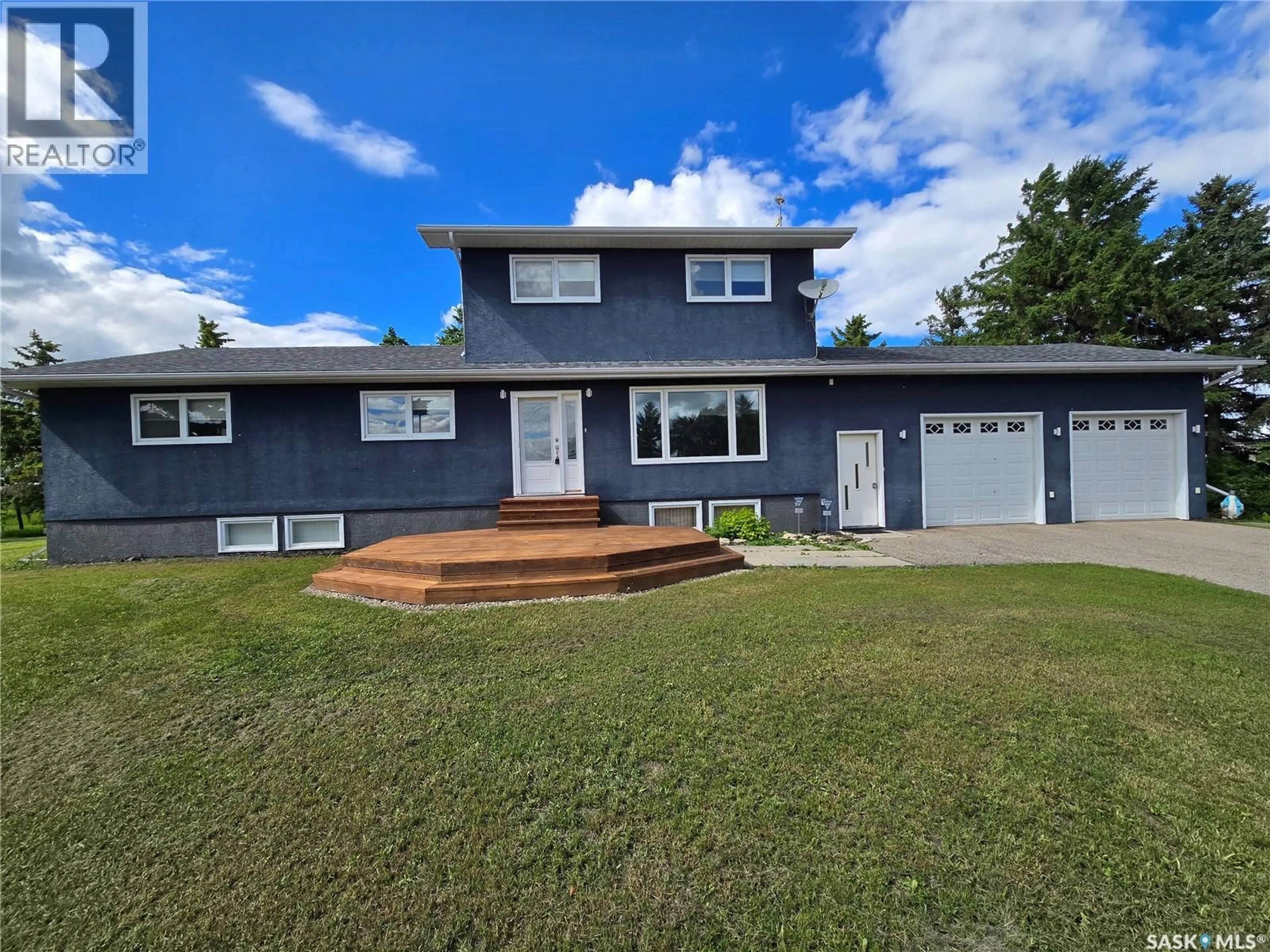 Home with vinyl exterior material, street for MUCHOWSKI ACREAGE, Montmartre Saskatchewan S0G3M0