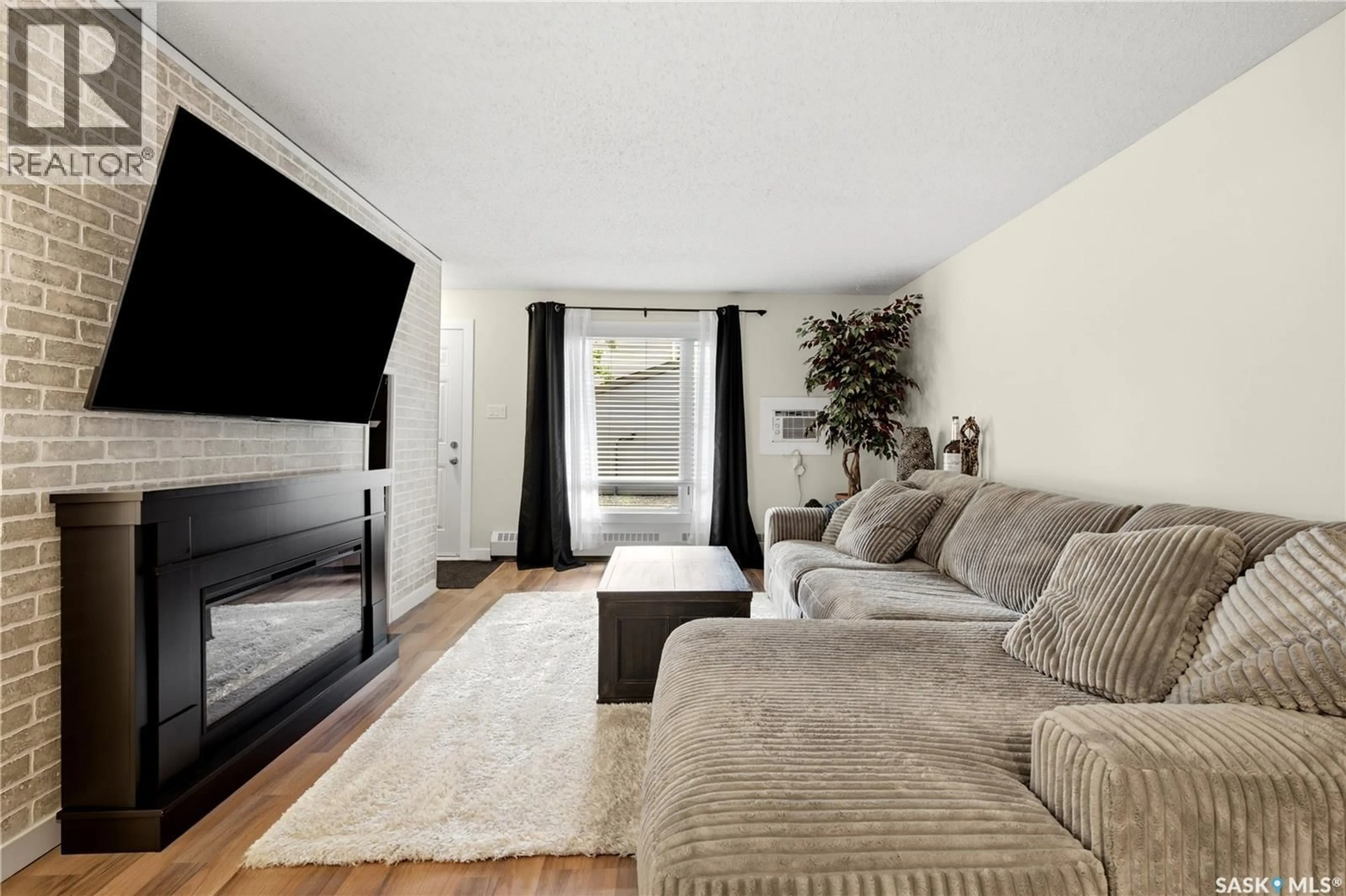 Living room with furniture, unknown for 50 NOLLET AVENUE, Regina Saskatchewan S4T7T9
