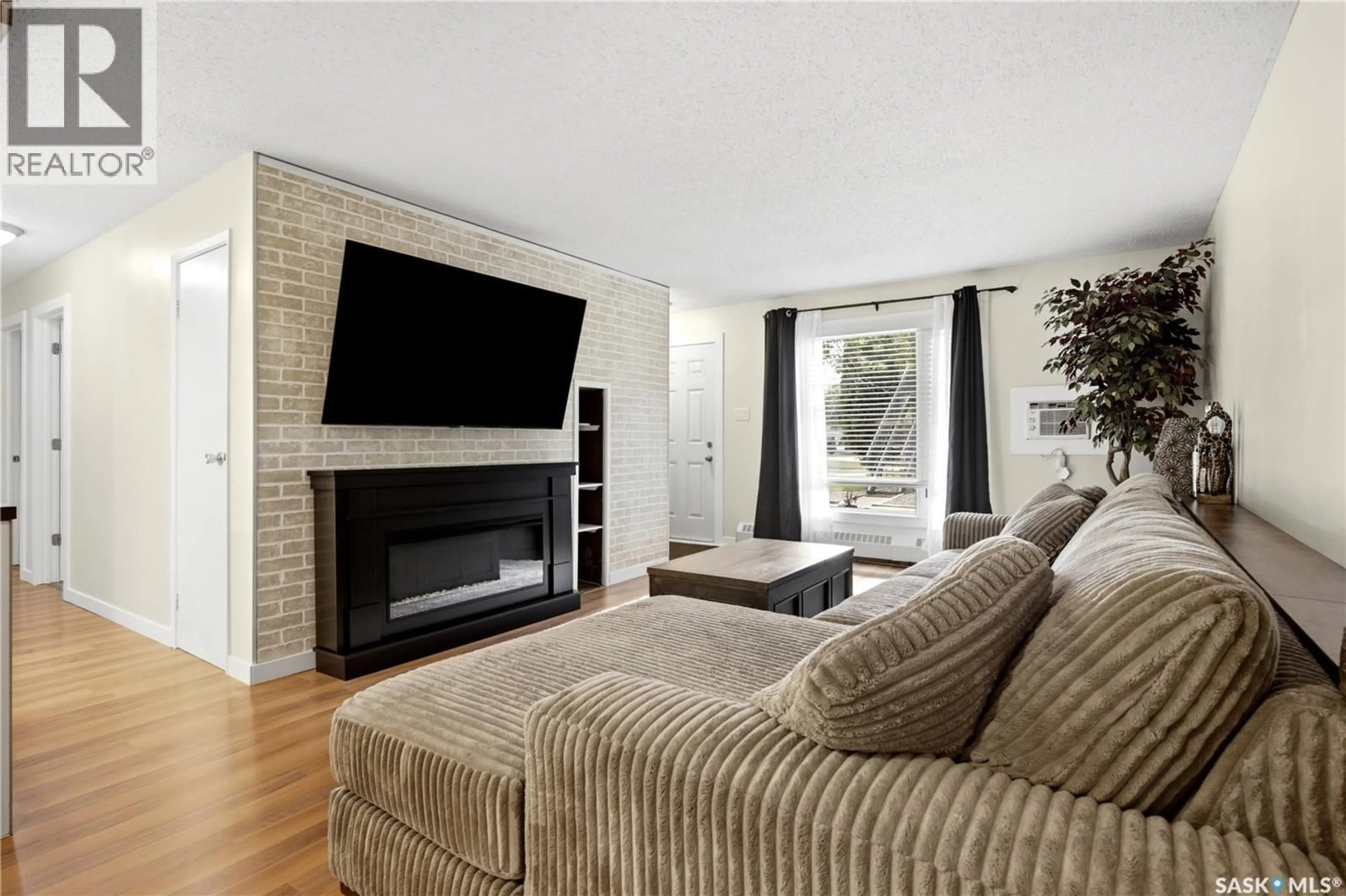 Living room with furniture, unknown for 50 NOLLET AVENUE, Regina Saskatchewan S4T7T9