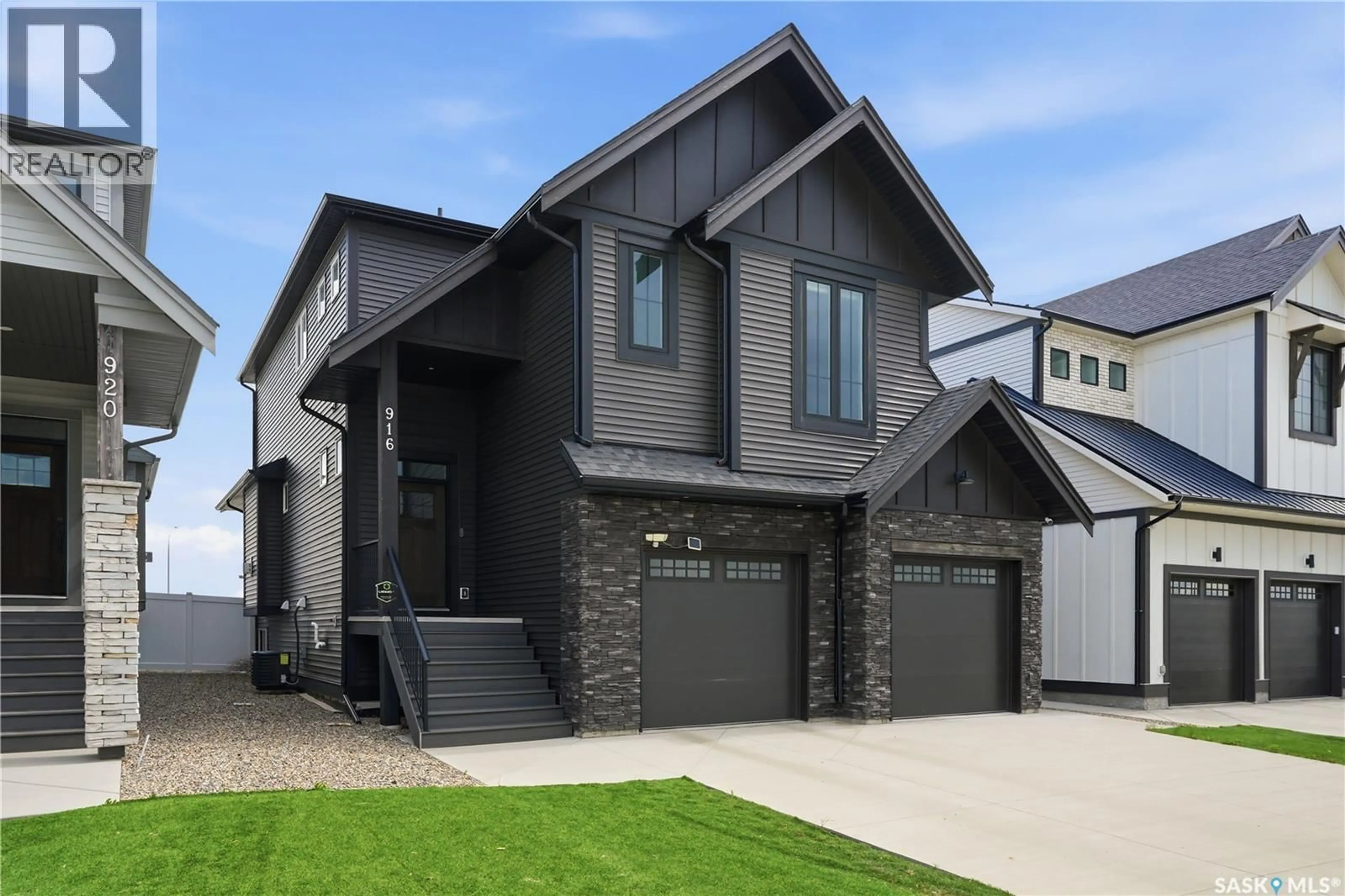 Home with vinyl exterior material, street for 916 FEHEREGYHAZI BOULEVARD, Saskatoon Saskatchewan S7W1E1