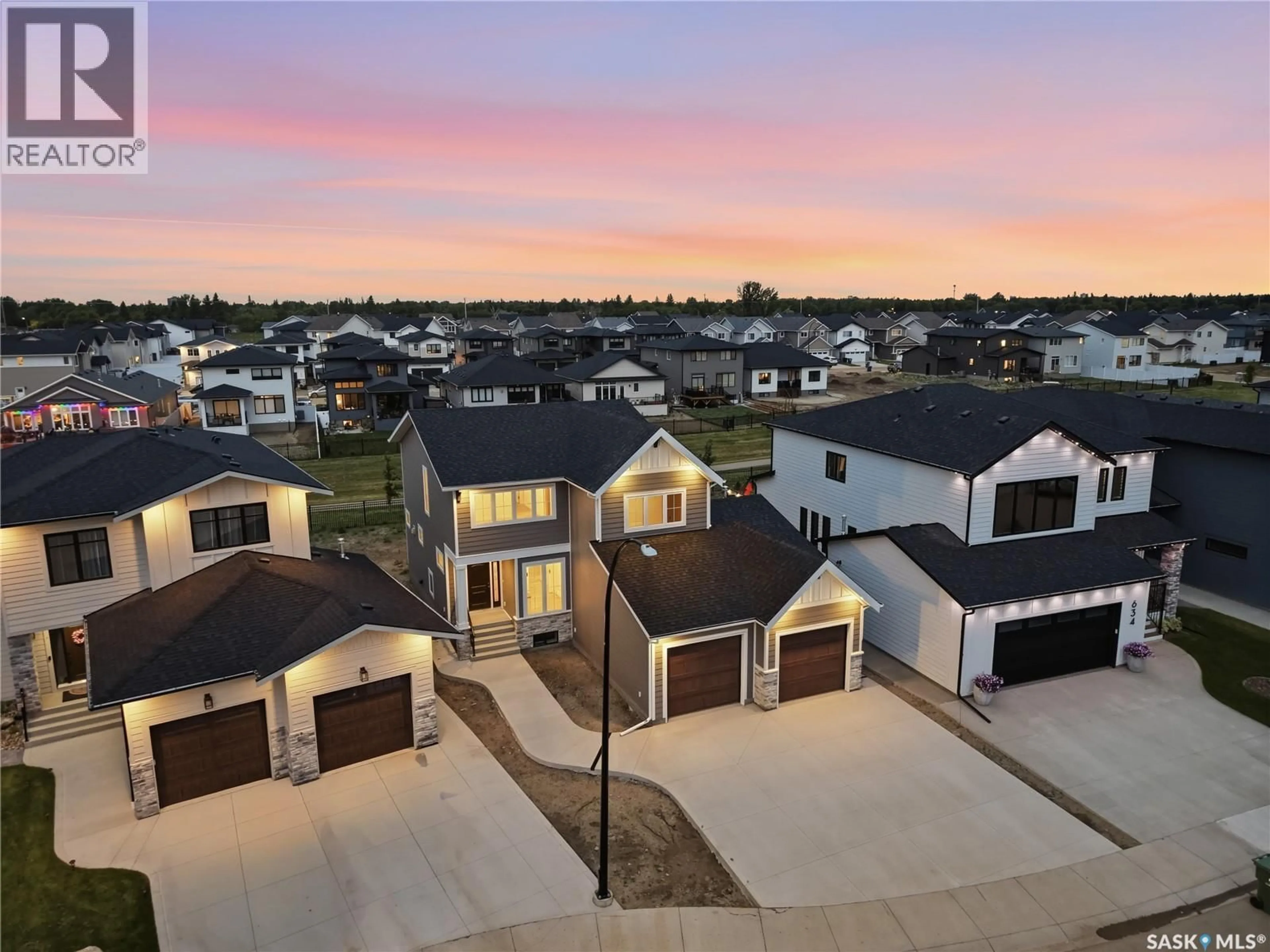 A pic from outside/outdoor area/front of a property/back of a property/a pic from drone, street for 638 PEPPER BEND, Saskatoon Saskatchewan S7V1T1