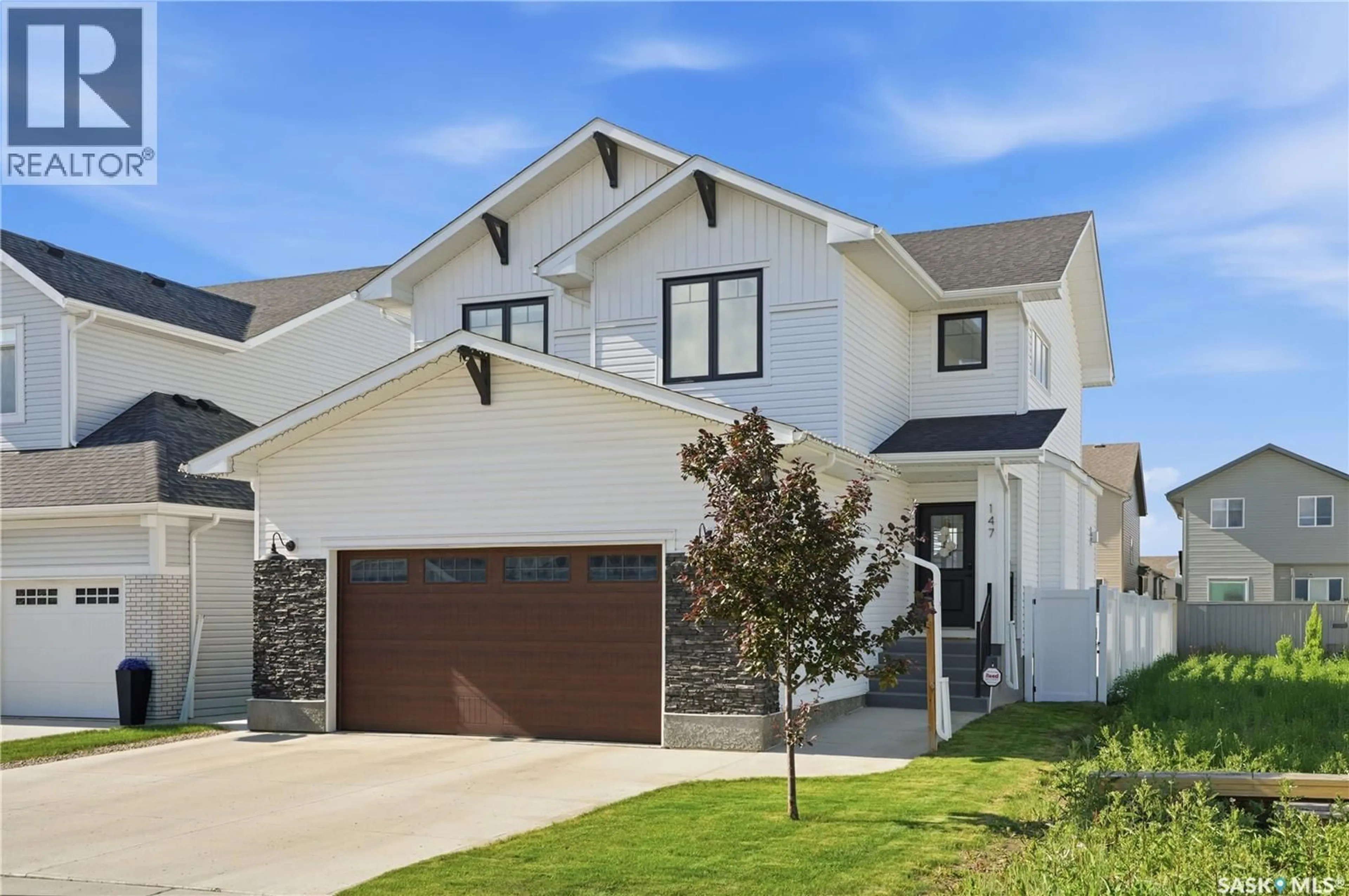 Home with brick exterior material, street for 147 BARRETT STREET, Saskatoon Saskatchewan S7W0Z8