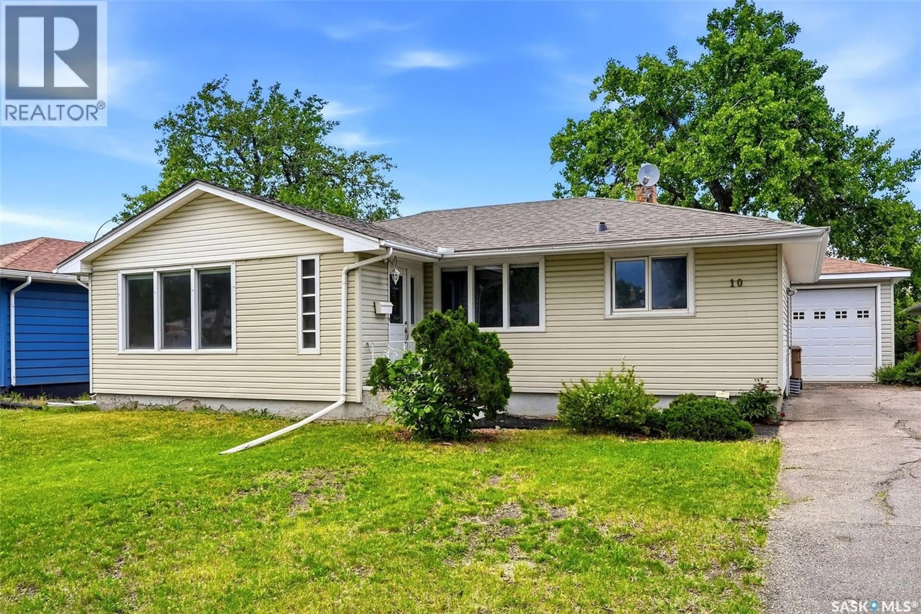 Home with vinyl exterior material, street for 10 LAMONT CRESCENT, Regina Saskatchewan S4S4A4