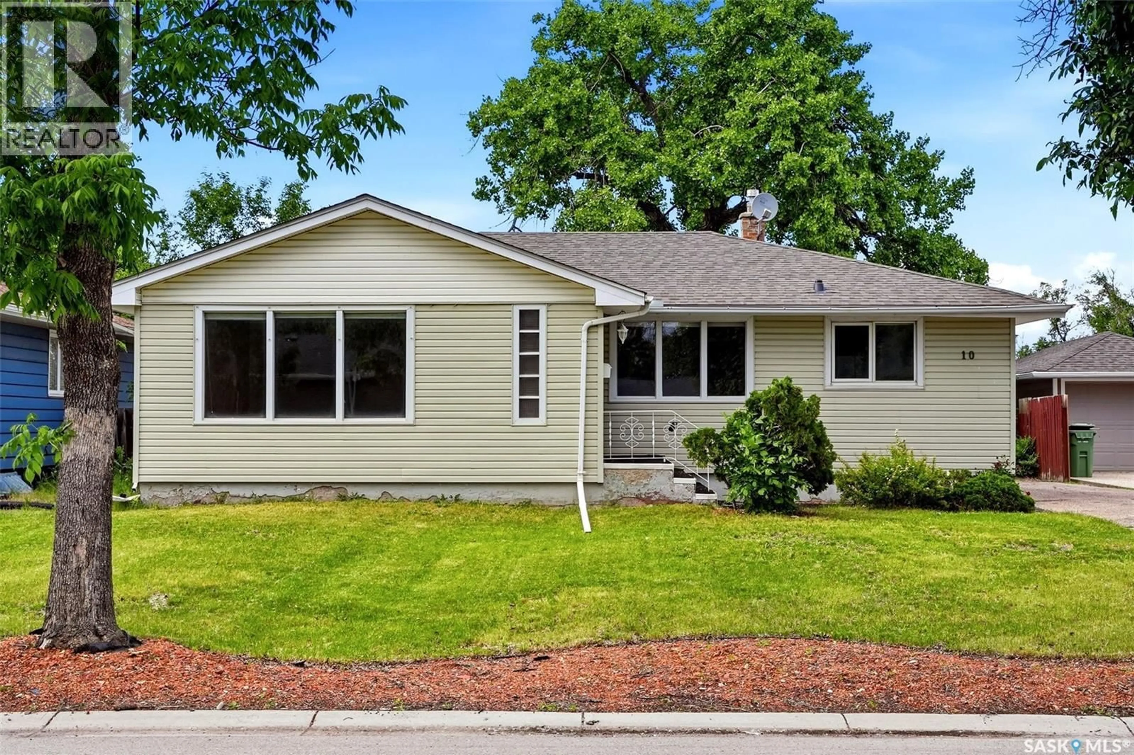 Home with vinyl exterior material, street for 10 LAMONT CRESCENT, Regina Saskatchewan S4S4A4