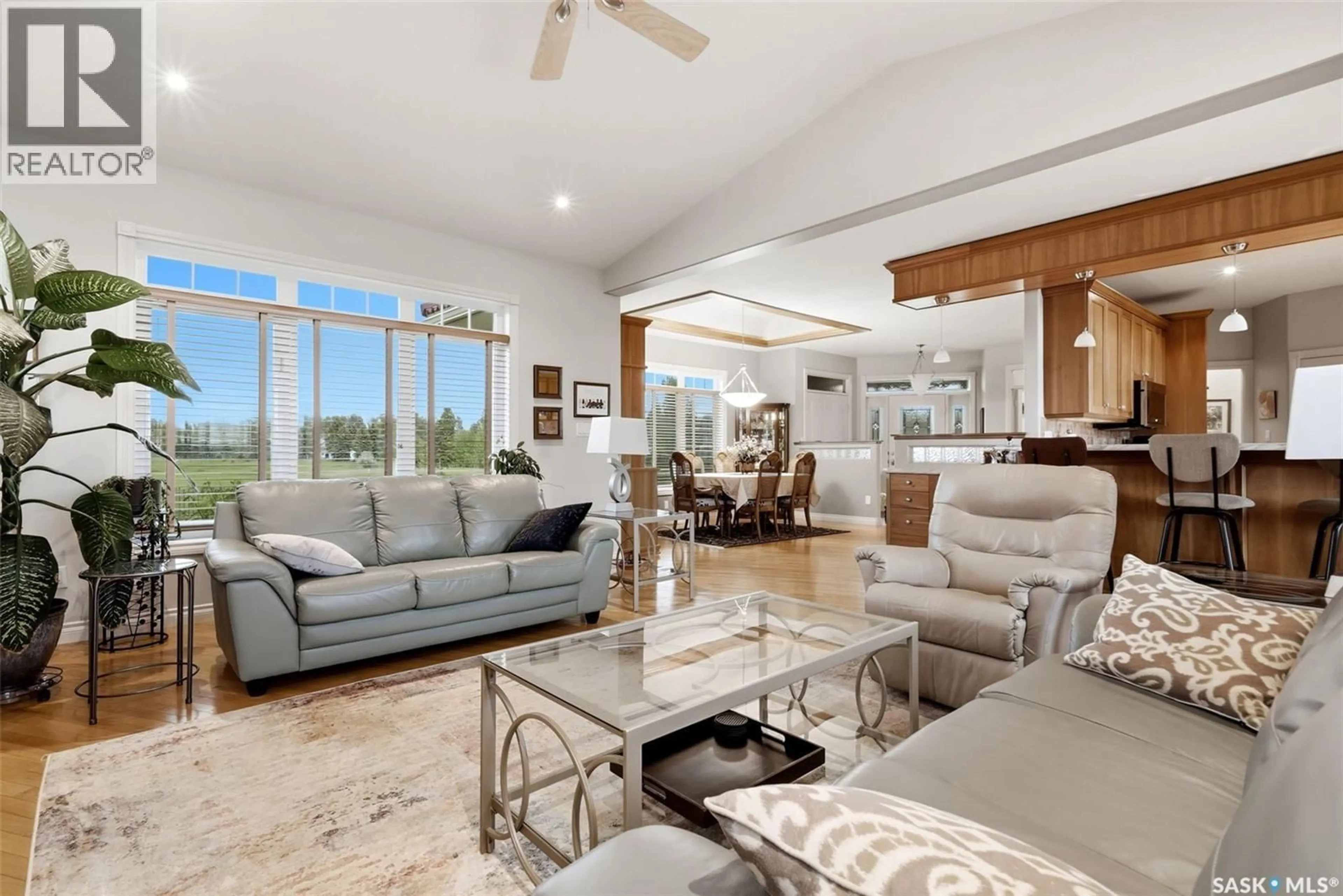 Living room with furniture, ceramic/tile floor for 12 ST ANDREWS BAY, Edenwold Rm No.158 Saskatchewan S4L1A2