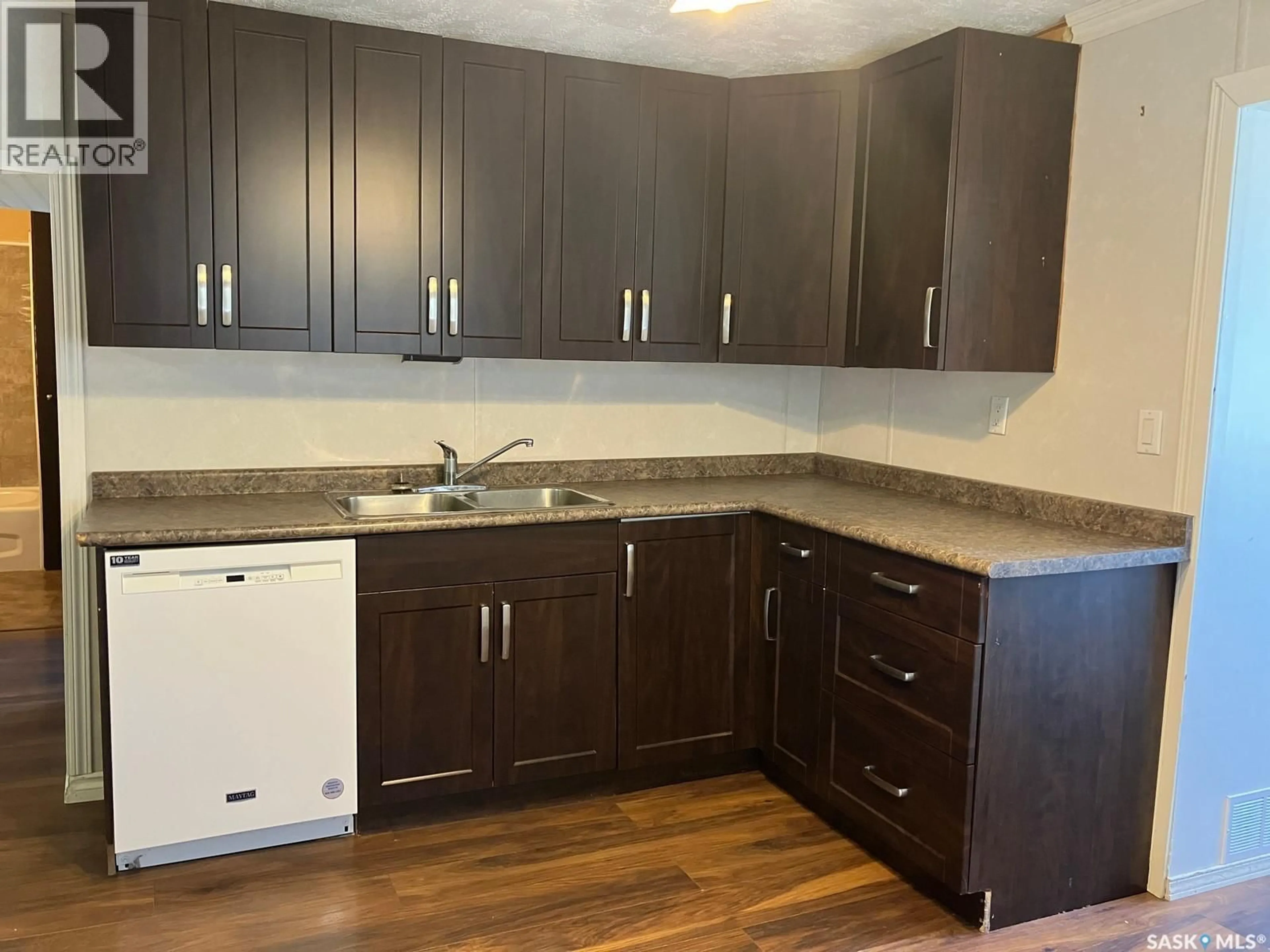 Standard kitchen, wood/laminate floor for 911 1ST STREET, Nipawin Saskatchewan S0E1E0