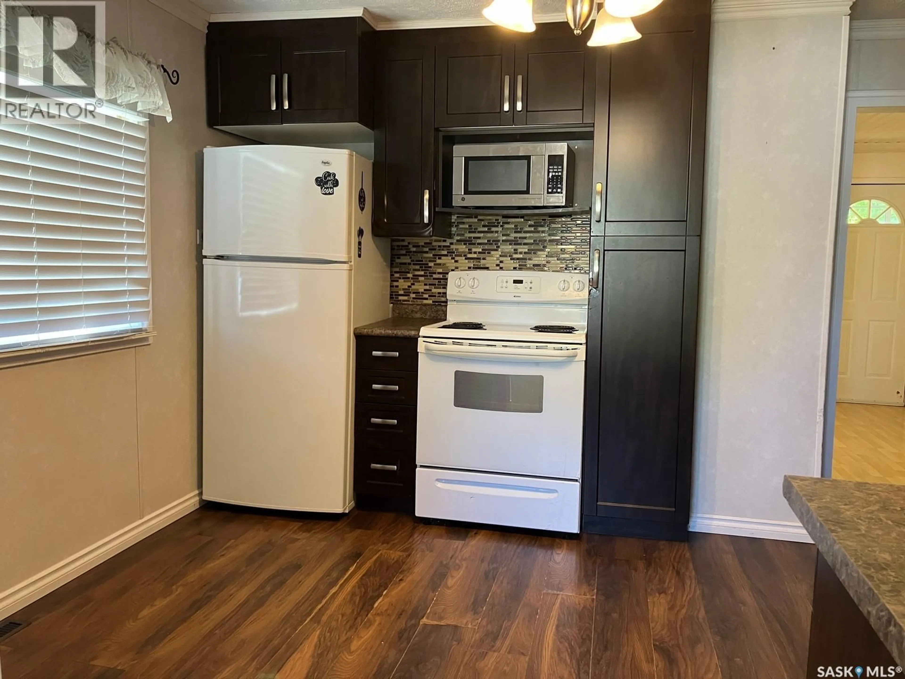 Standard kitchen, wood/laminate floor for 911 1ST STREET, Nipawin Saskatchewan S0E1E0