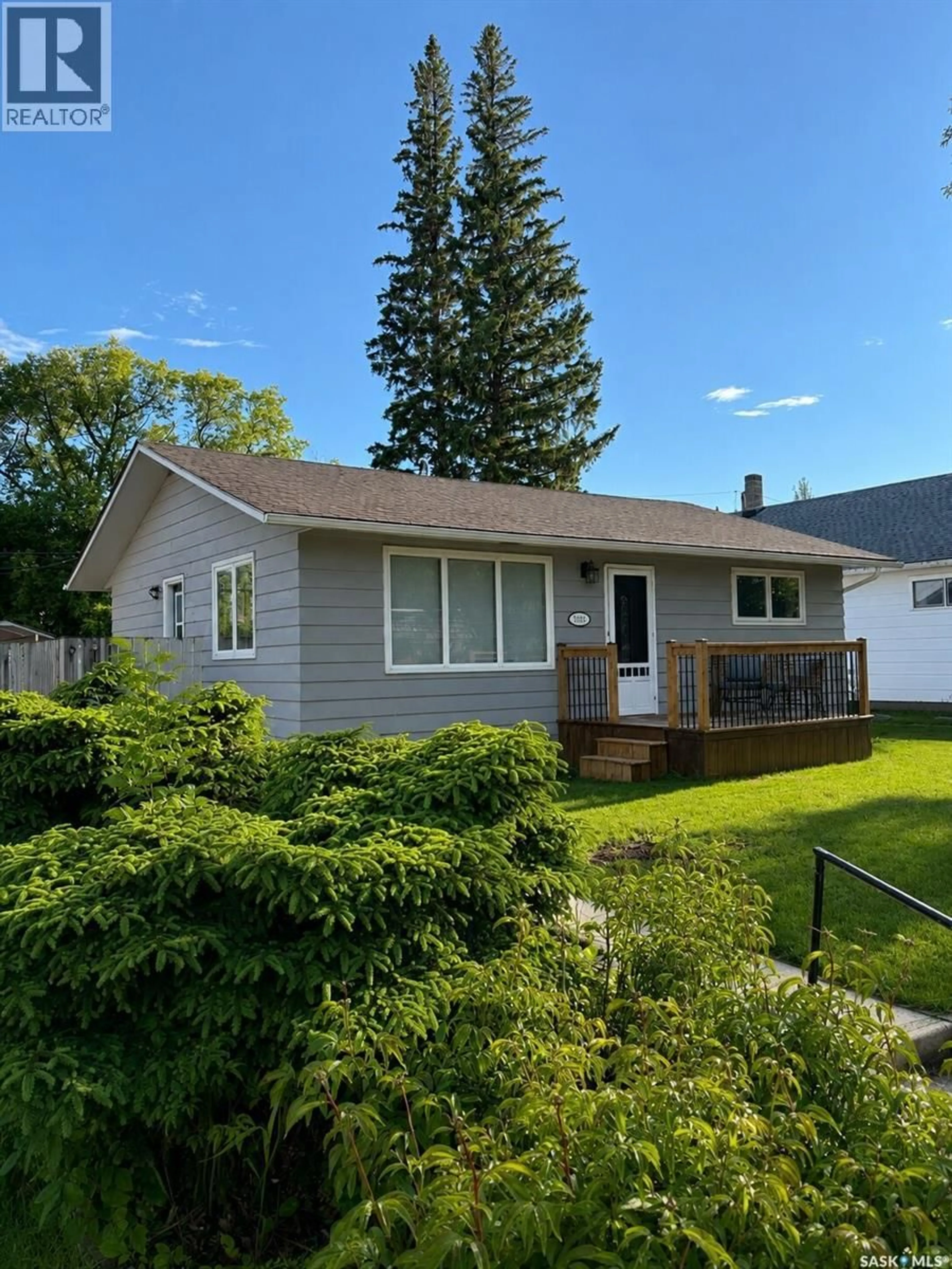 Home with vinyl exterior material, street for 3015 5TH STREET, Rosthern Saskatchewan S0K3R0