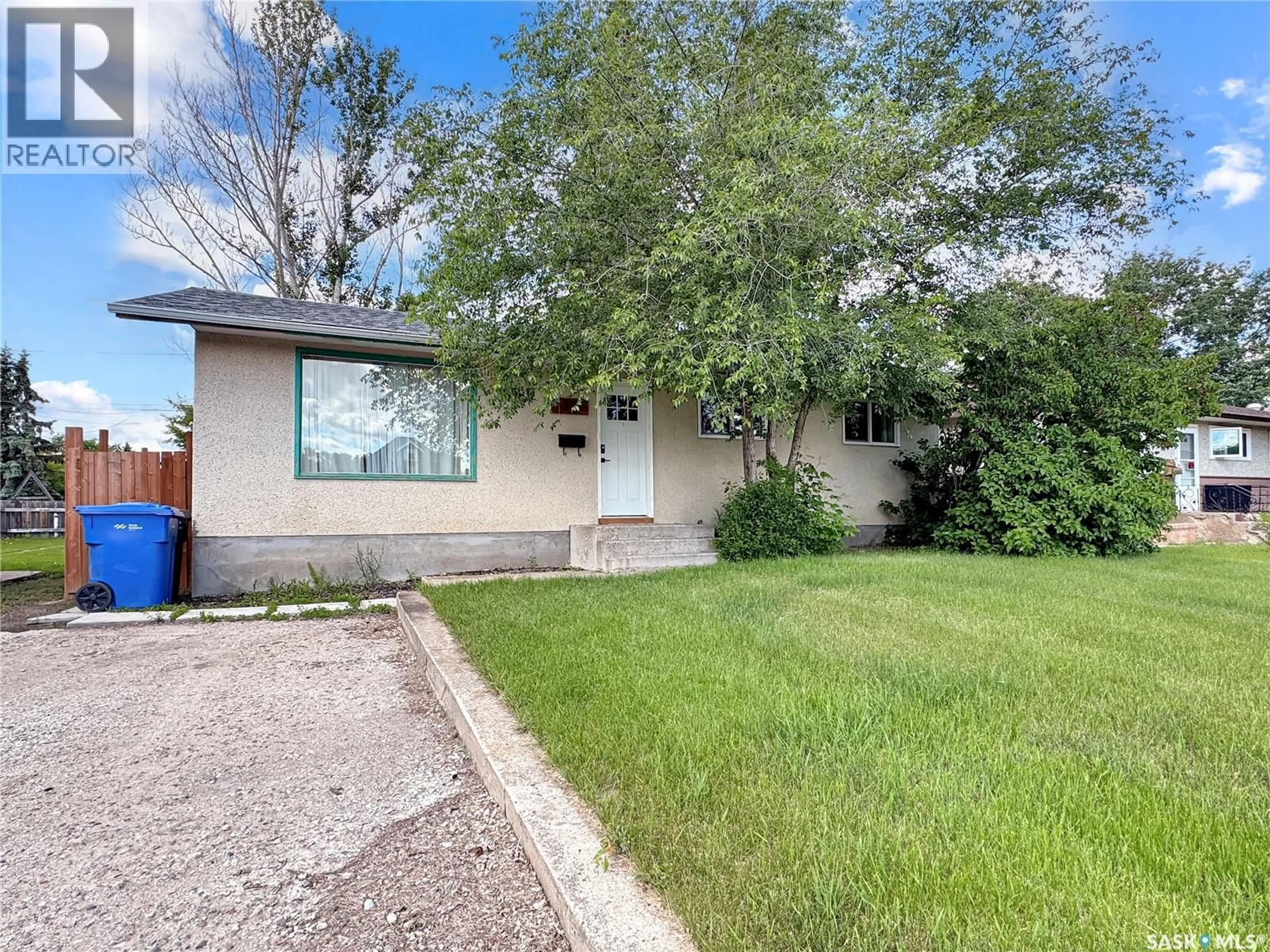 Home with vinyl exterior material, street for 1321 108TH STREET, North Battleford Saskatchewan S9A2B6