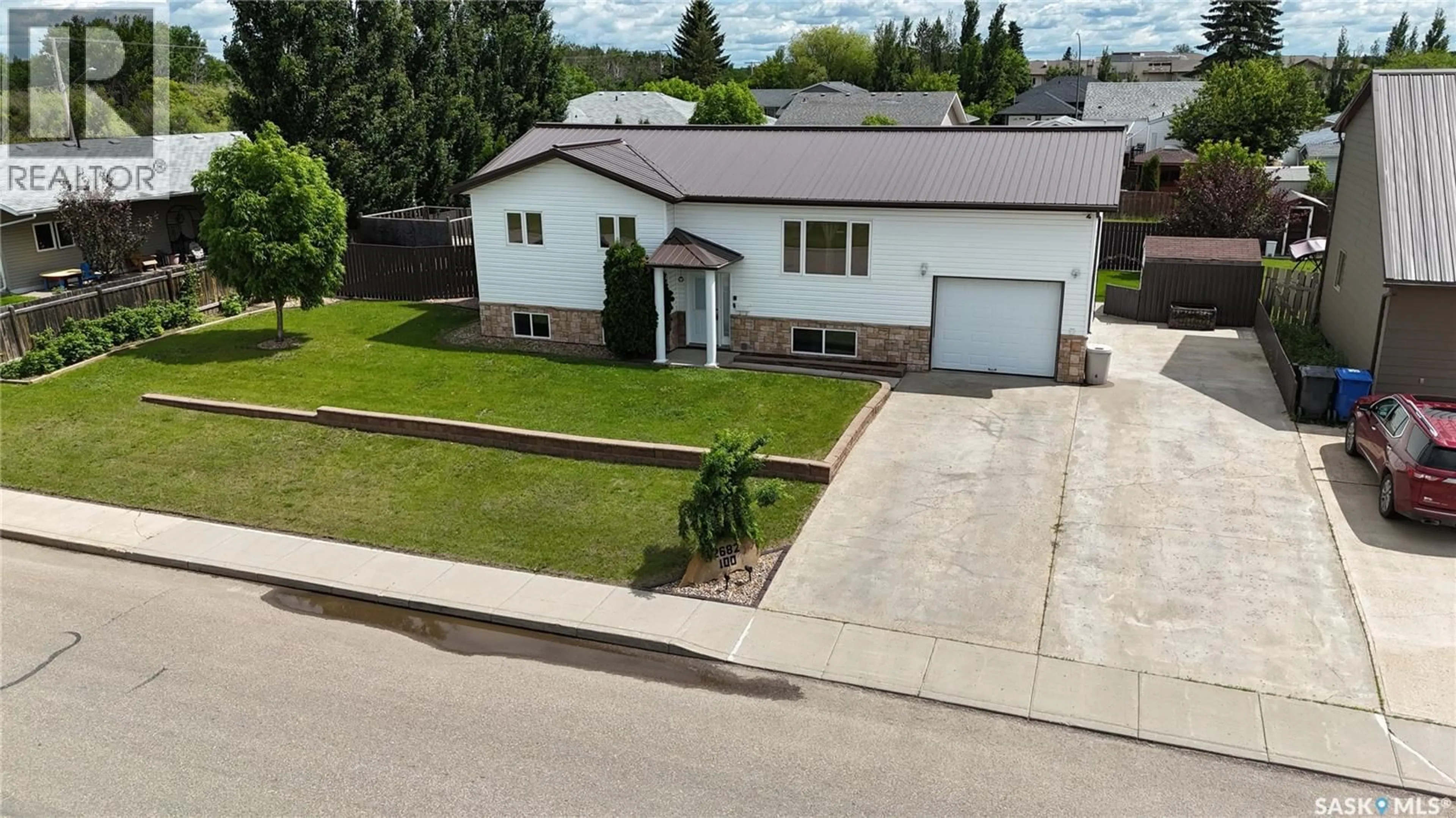 A pic from outside/outdoor area/front of a property/back of a property/a pic from drone, street for 2682 100TH STREET, North Battleford Saskatchewan S9A0Y4