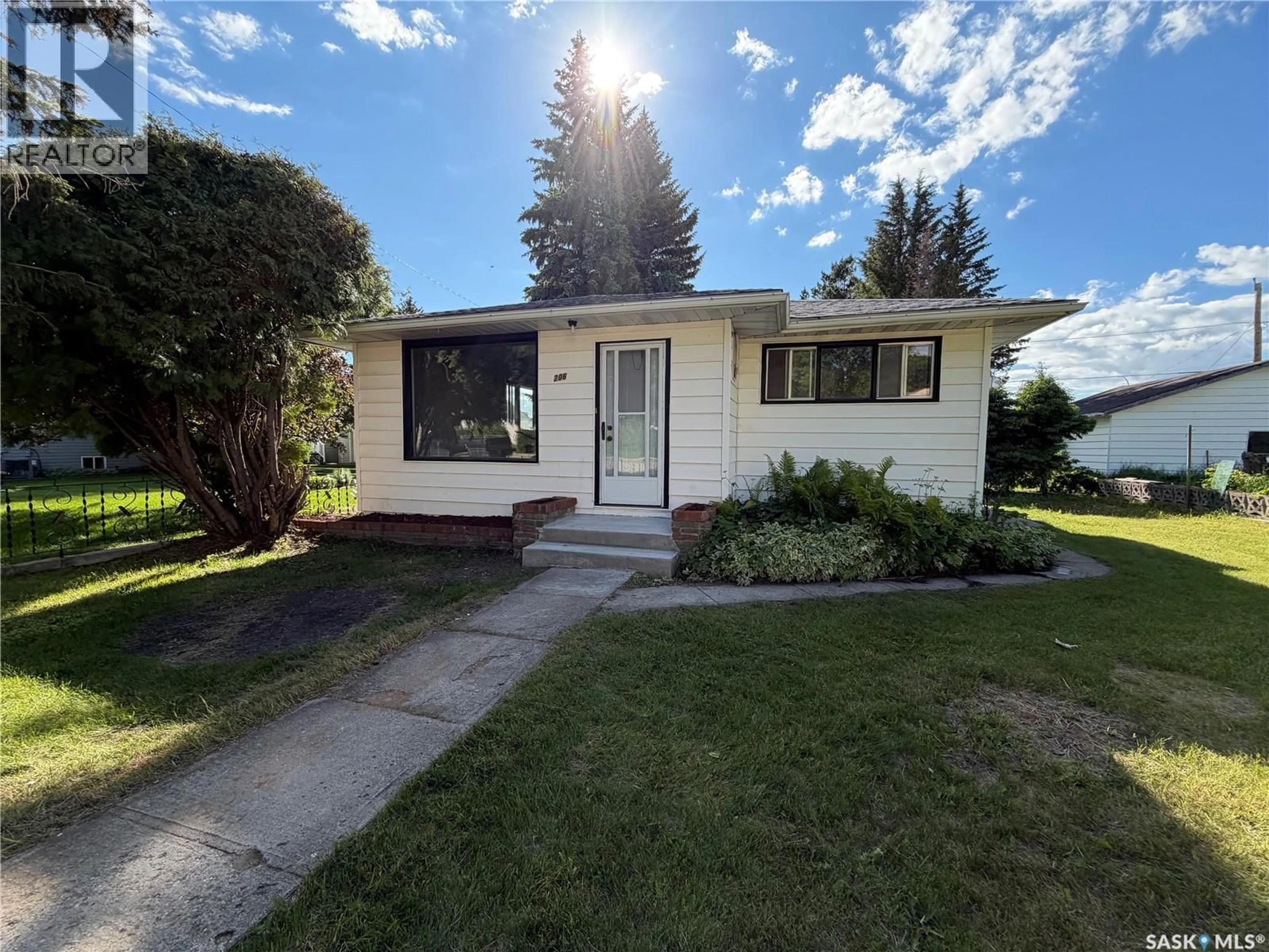 Home with vinyl exterior material, street for 206 WATSON STREET, Lipton Saskatchewan S0G3B0