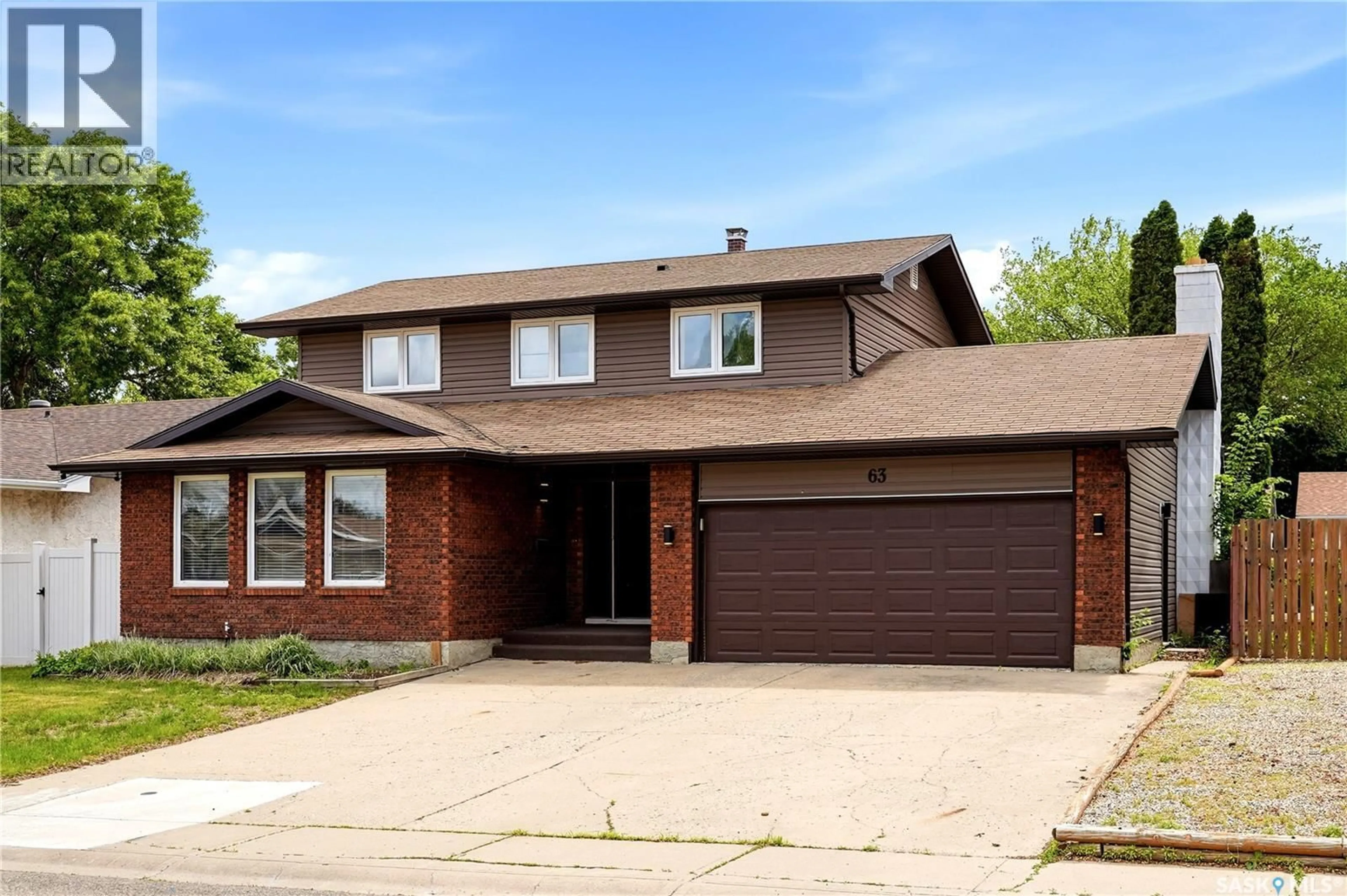 Home with brick exterior material, street for 63 METCALFE ROAD, Regina Saskatchewan S4V0H6