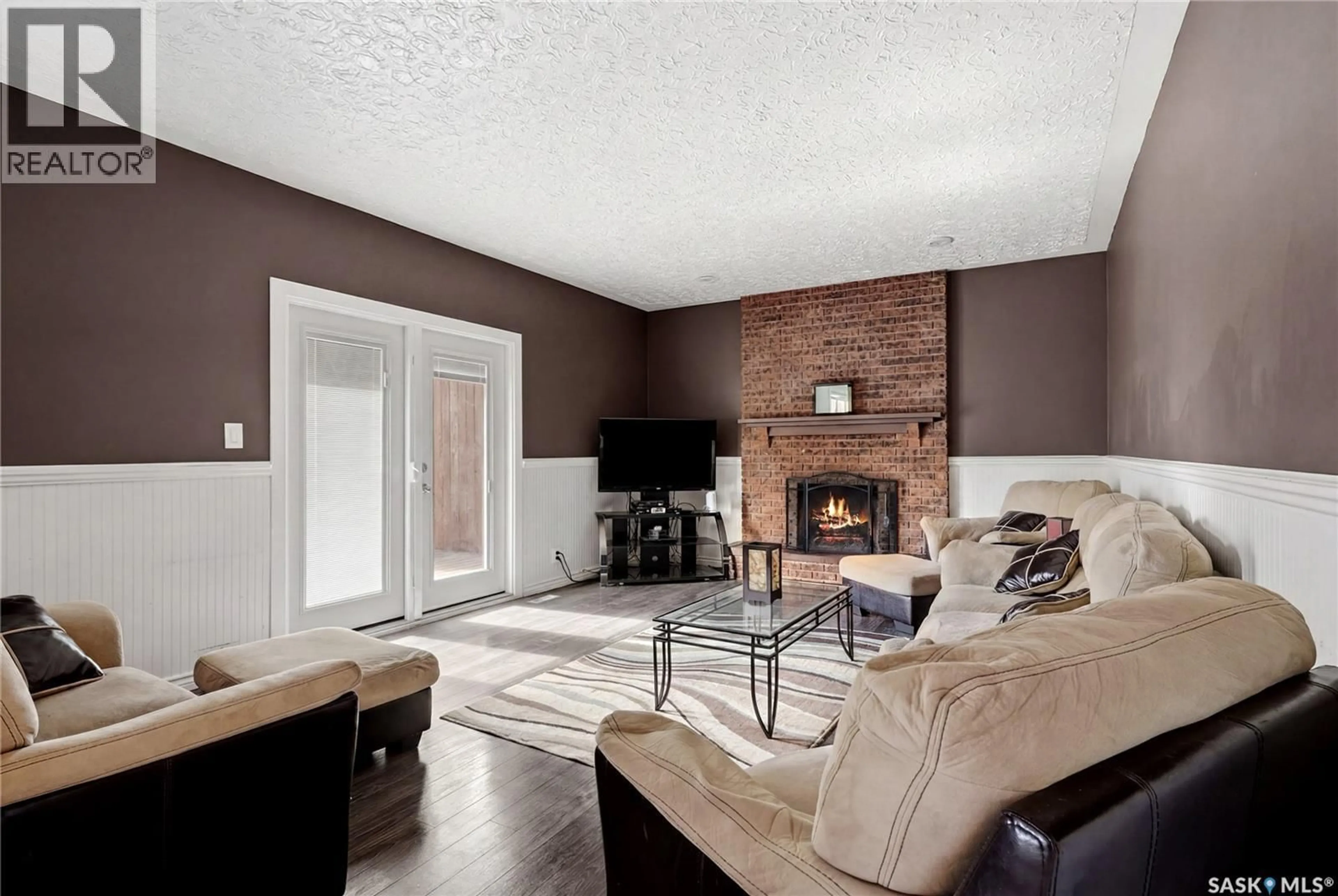 Living room with furniture, unknown for 63 METCALFE ROAD, Regina Saskatchewan S4V0H6