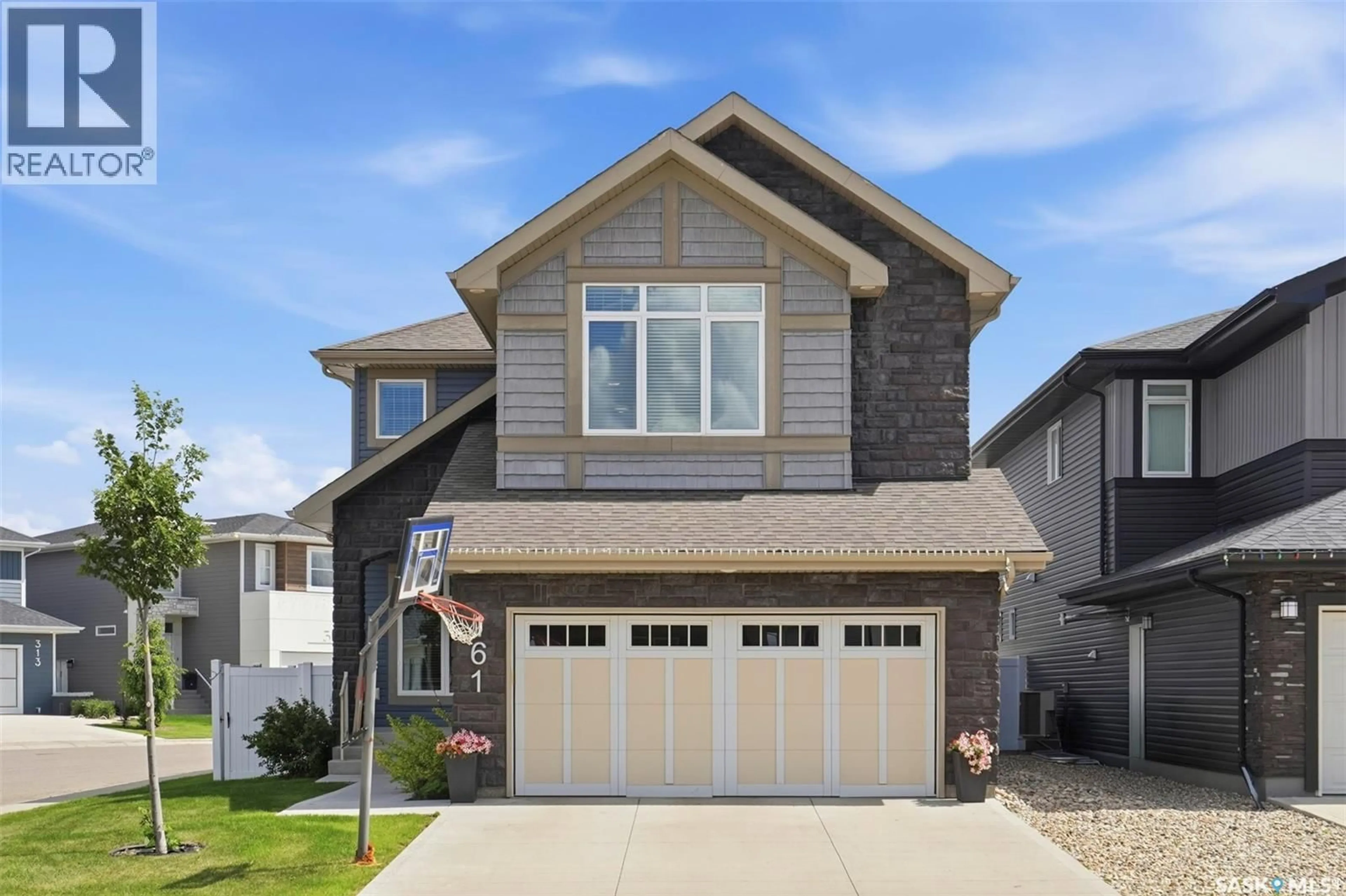 Home with vinyl exterior material, street for 161 DUBOIS CRESCENT, Saskatoon Saskatchewan S7V0R5