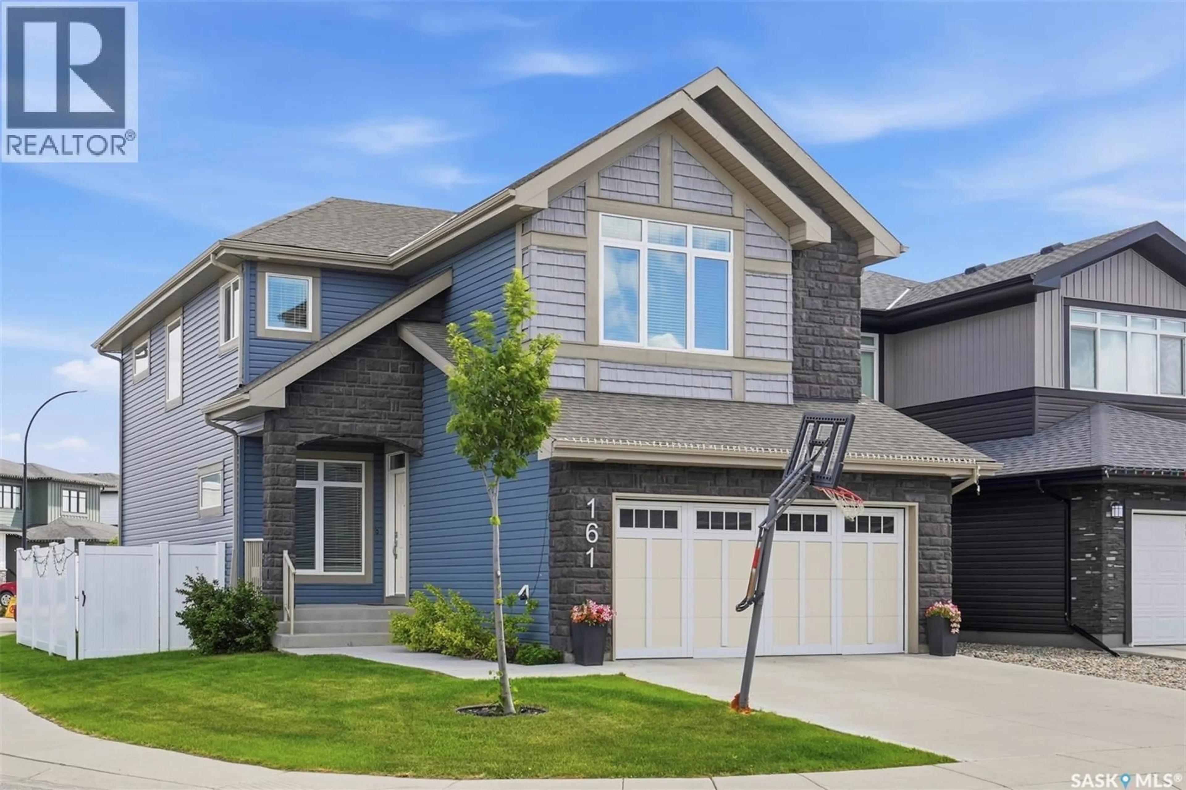 Home with vinyl exterior material, street for 161 DUBOIS CRESCENT, Saskatoon Saskatchewan S7V0R5