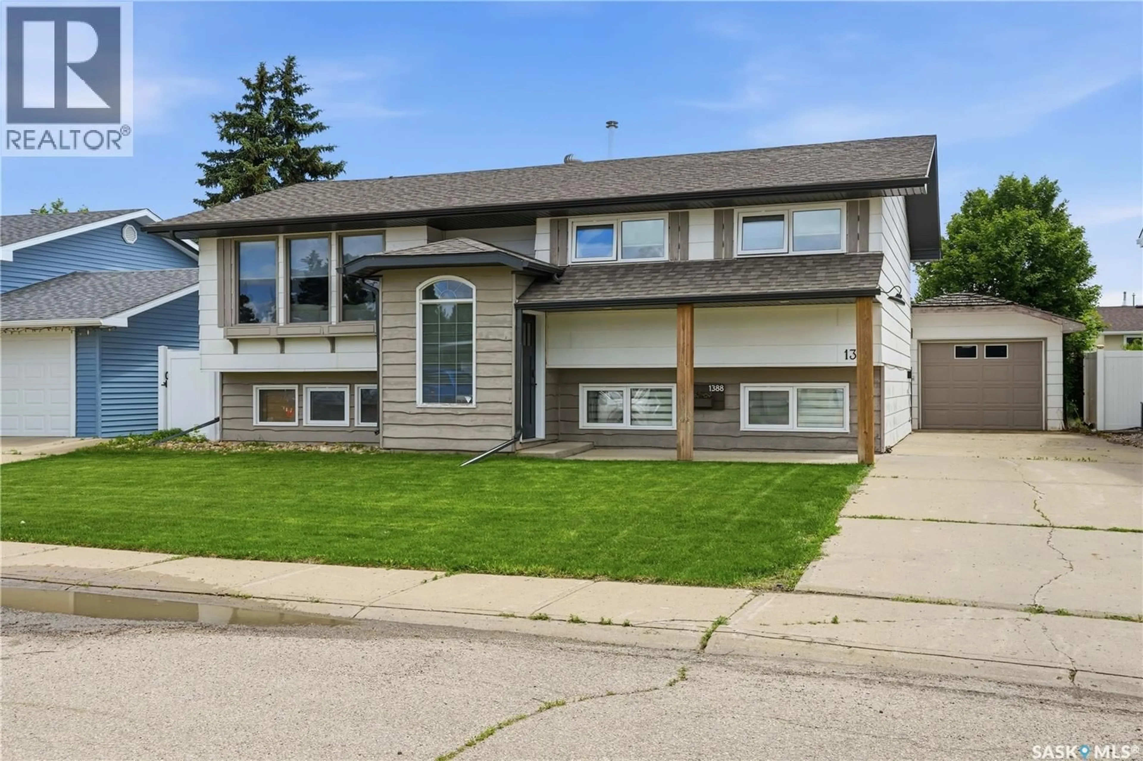 Home with vinyl exterior material, street for 1388 PRINCE CRESCENT, Moose Jaw Saskatchewan S6H6E5
