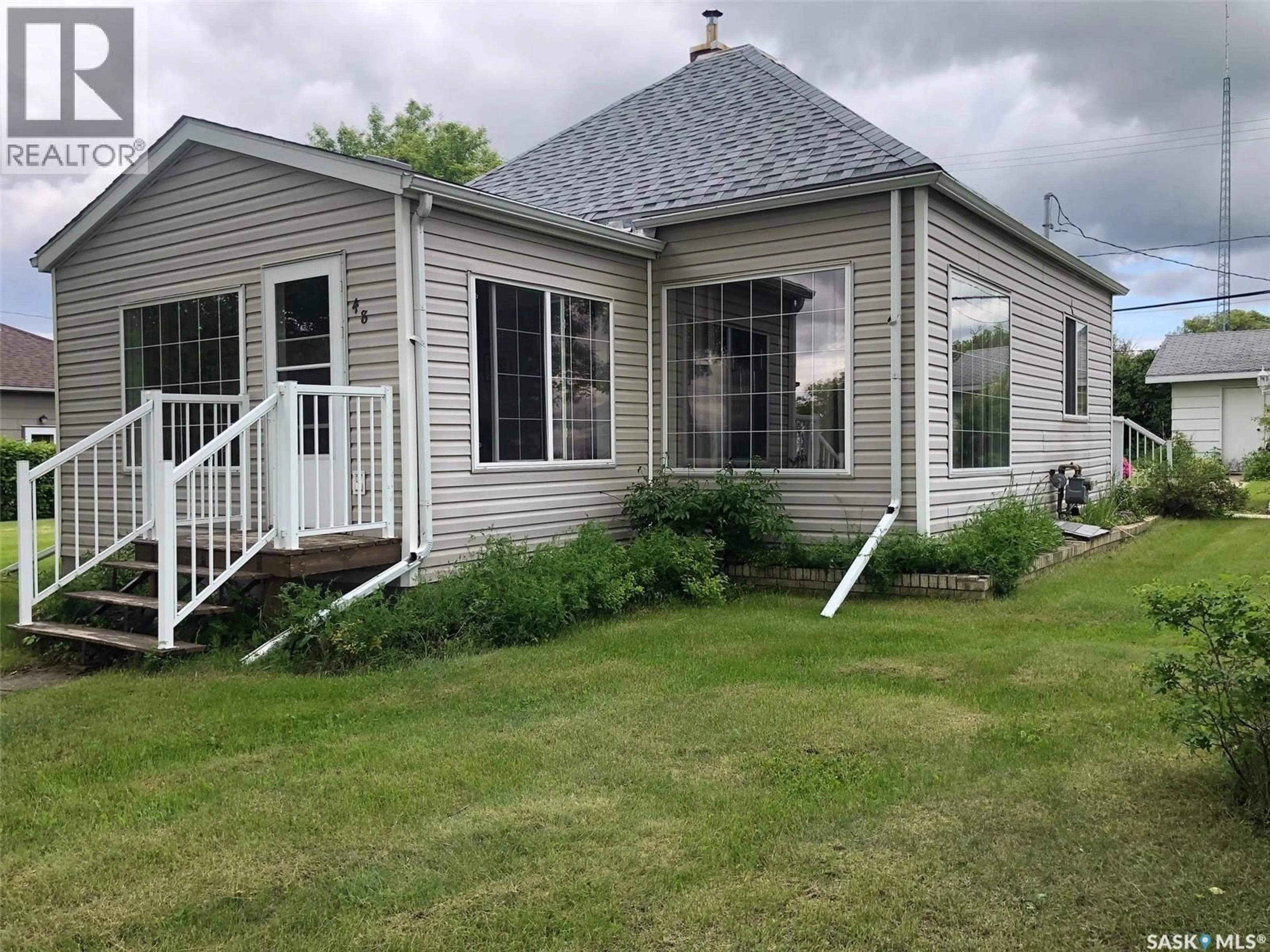Home with vinyl exterior material, unknown for E - 48 HIGHWAY AVENUE, Preeceville Saskatchewan S0A3B0
