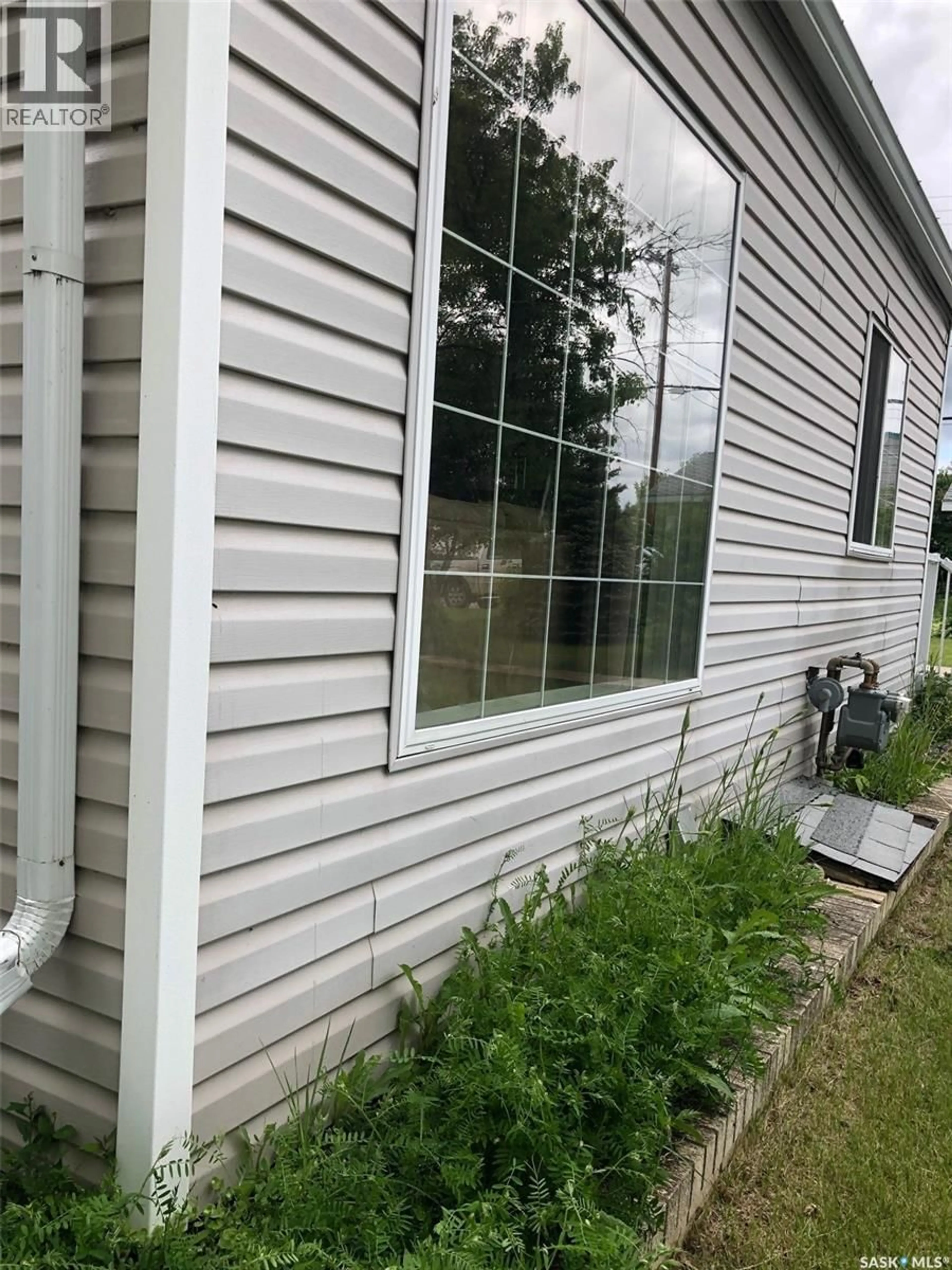 Home with vinyl exterior material, building for E - 48 HIGHWAY AVENUE, Preeceville Saskatchewan S0A3B0
