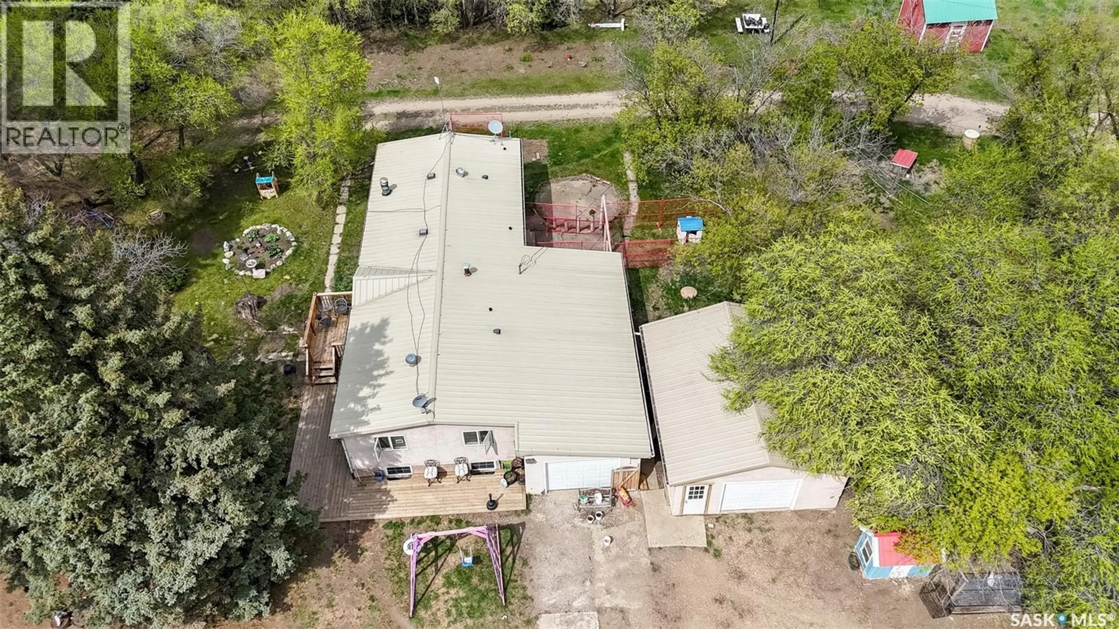 A pic from outside/outdoor area/front of a property/back of a property/a pic from drone, building for DE FEHR ACRES, Corman Park Rm No. 344 Saskatchewan S7K3J6