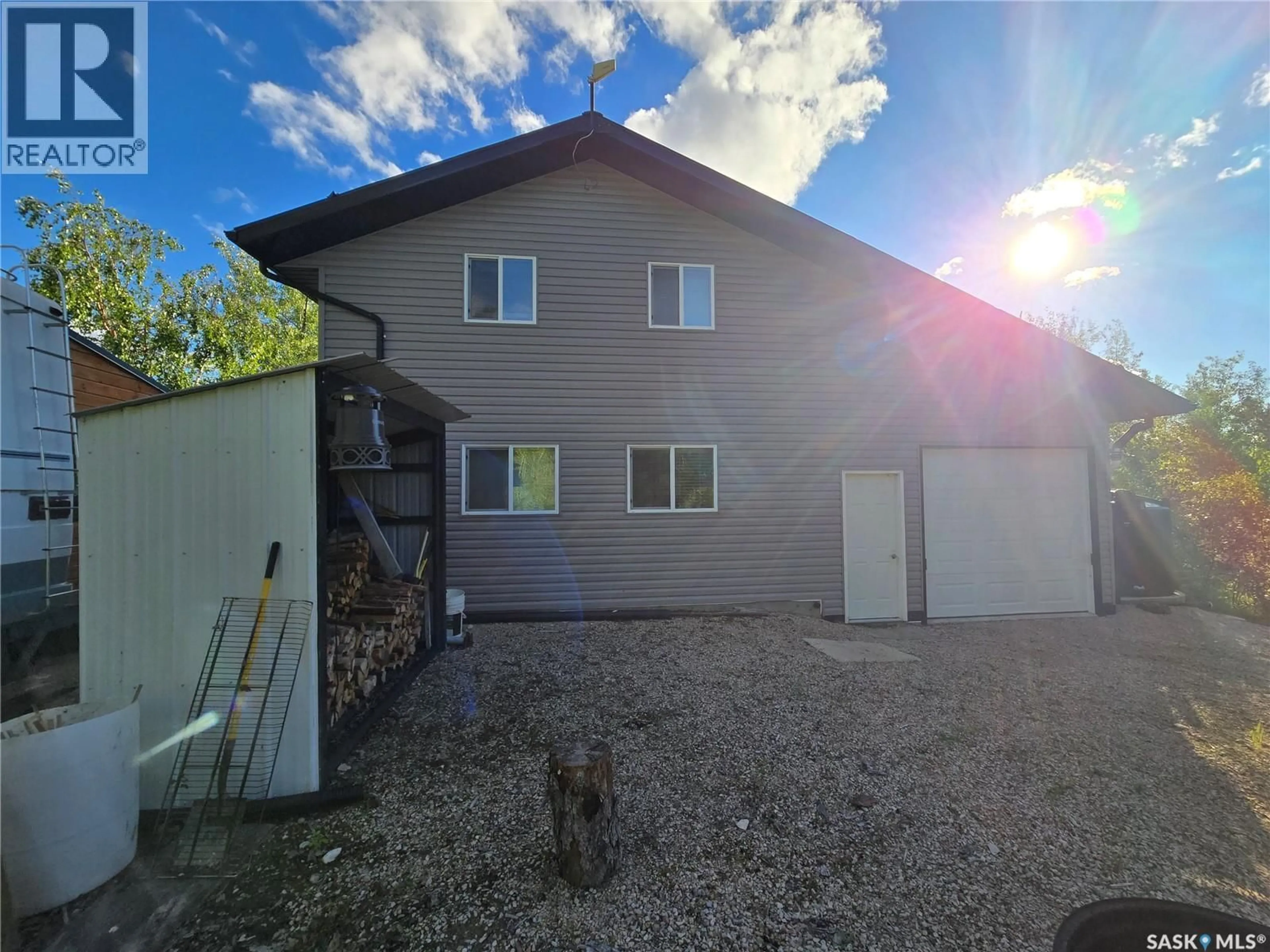A pic from outside/outdoor area/front of a property/back of a property/a pic from drone, building for 7 LAKEVIEW DRIVE, Northern Admin District Saskatchewan S0P0A0