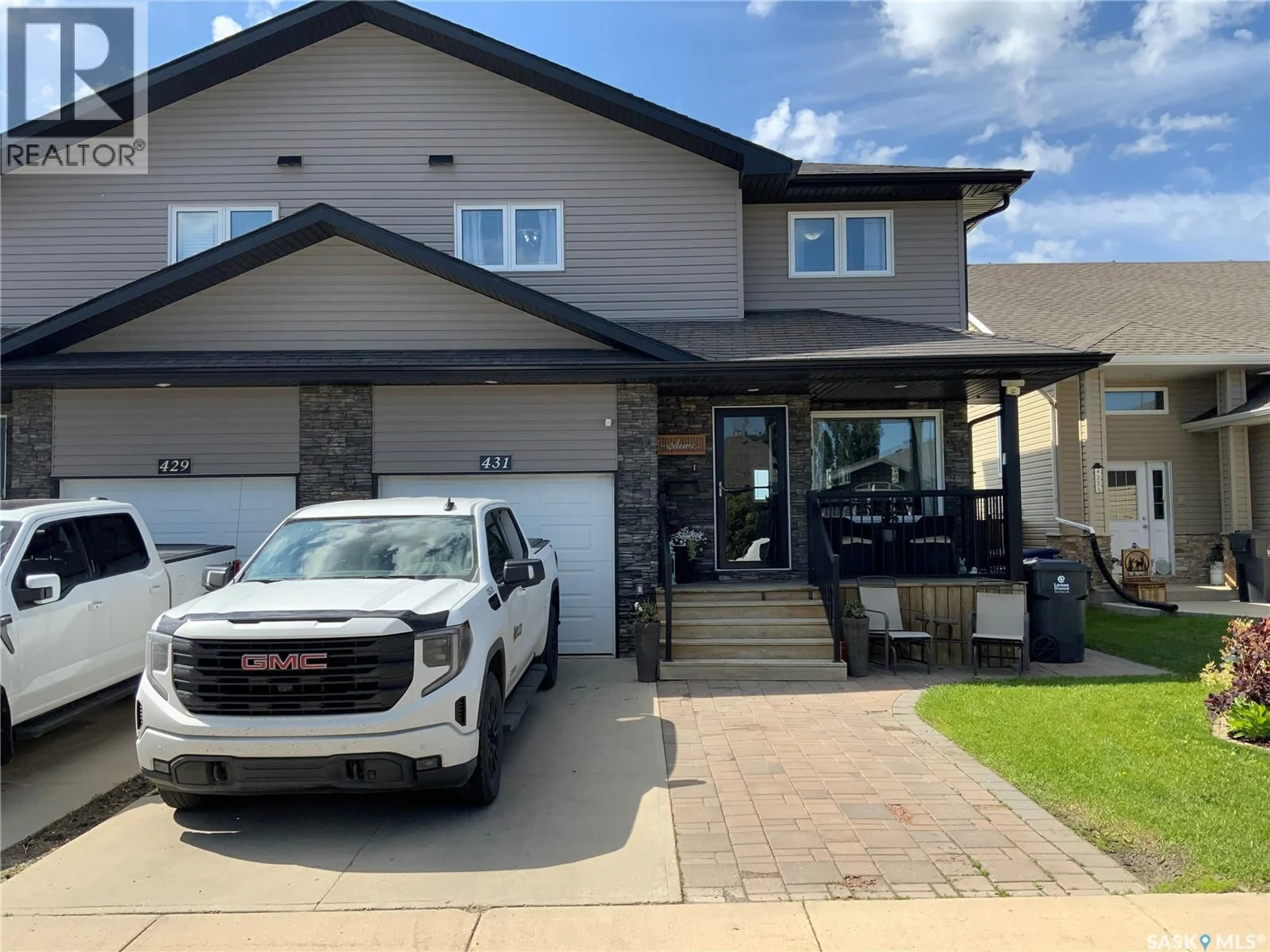 Home with vinyl exterior material, street for 431 BROOKLYN CRESCENT, Warman Saskatchewan S0K0A1