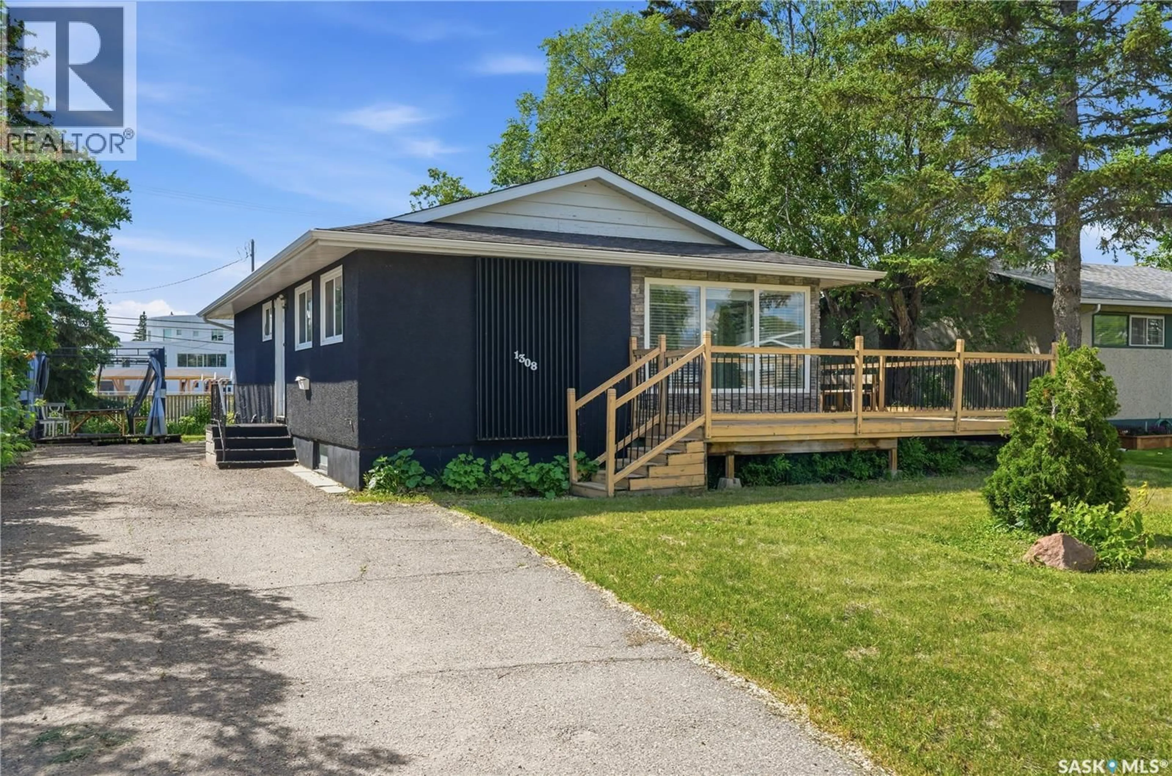 Home with vinyl exterior material, street for 1308 PRESTON AVENUE, Saskatoon Saskatchewan S7H2V4