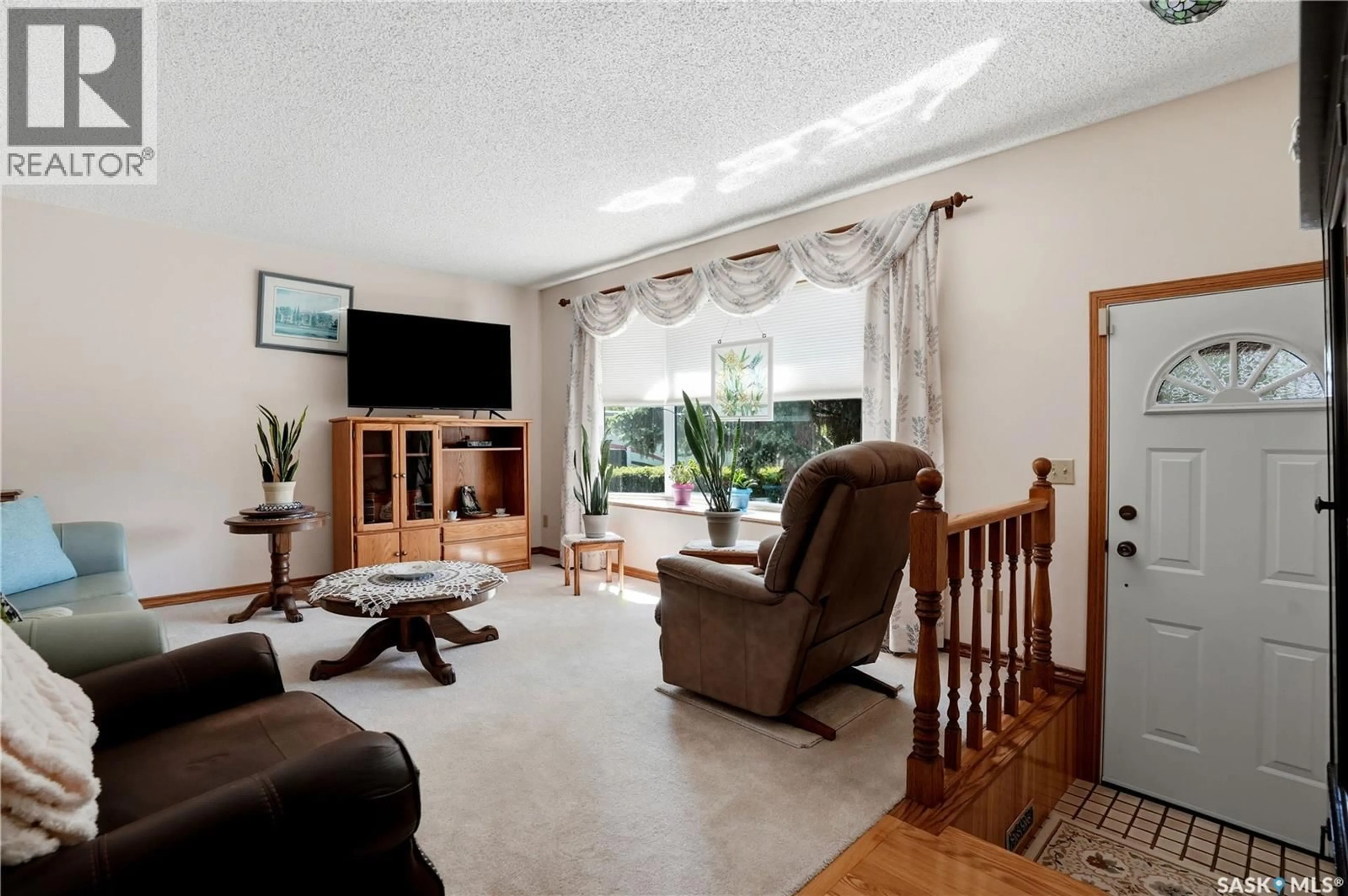 Living room with furniture, unknown for 710 3RD AVENUE, Pilot Butte Saskatchewan S0G0H5