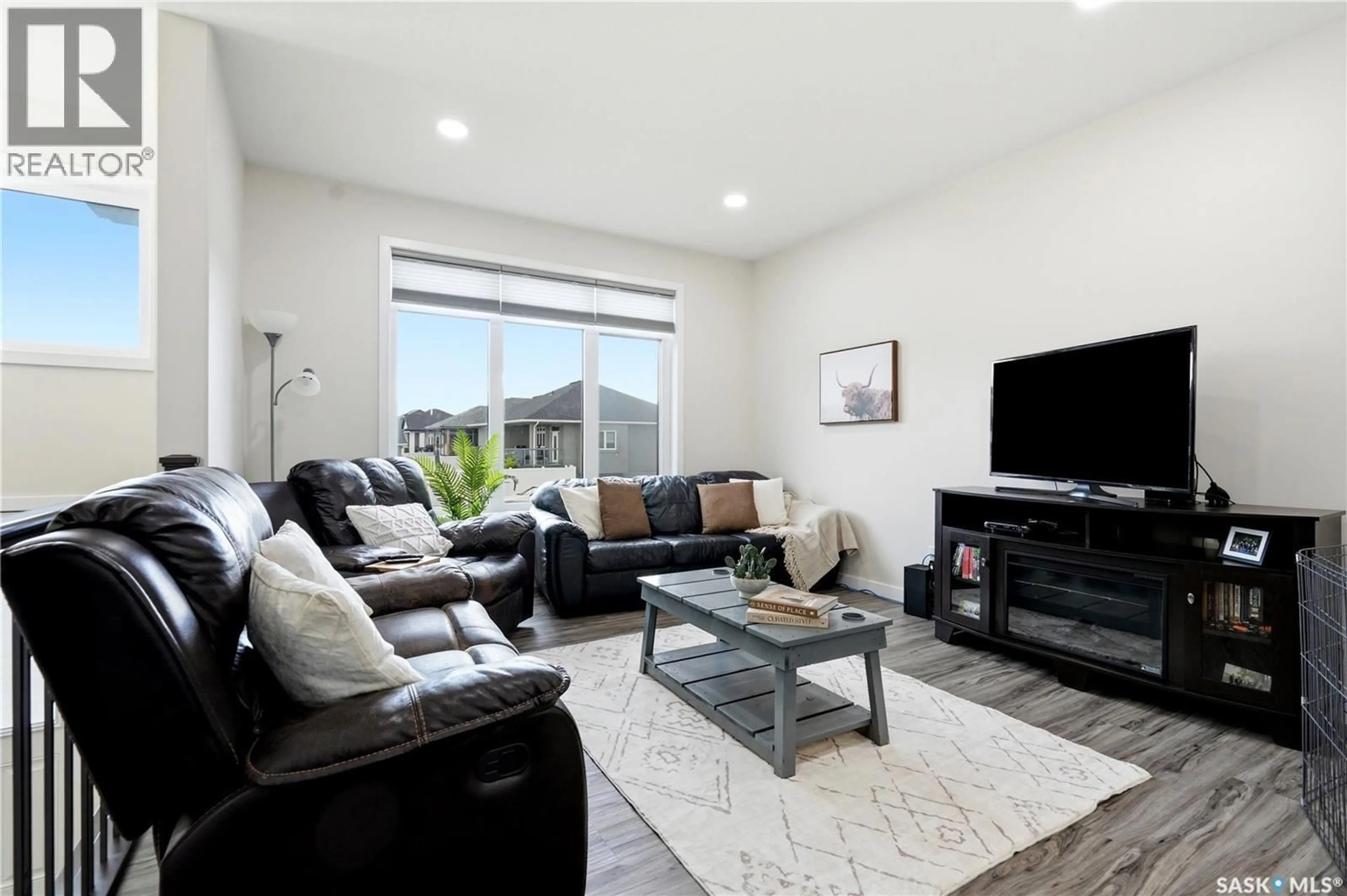 Living room with furniture, unknown for 505 MICKELSON LANE, Warman Saskatchewan S0K4S1