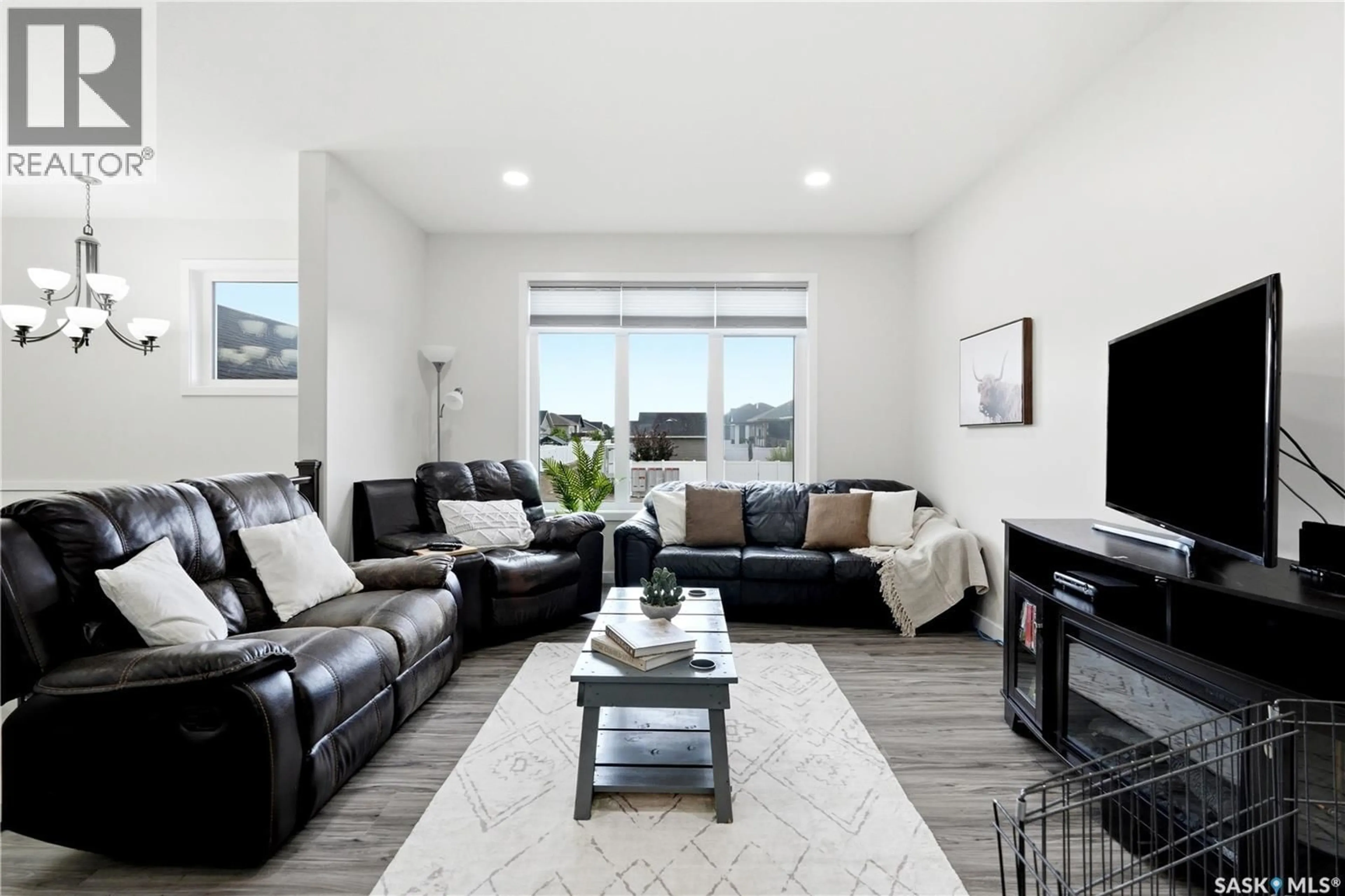 Living room with furniture, unknown for 505 MICKELSON LANE, Warman Saskatchewan S0K4S1