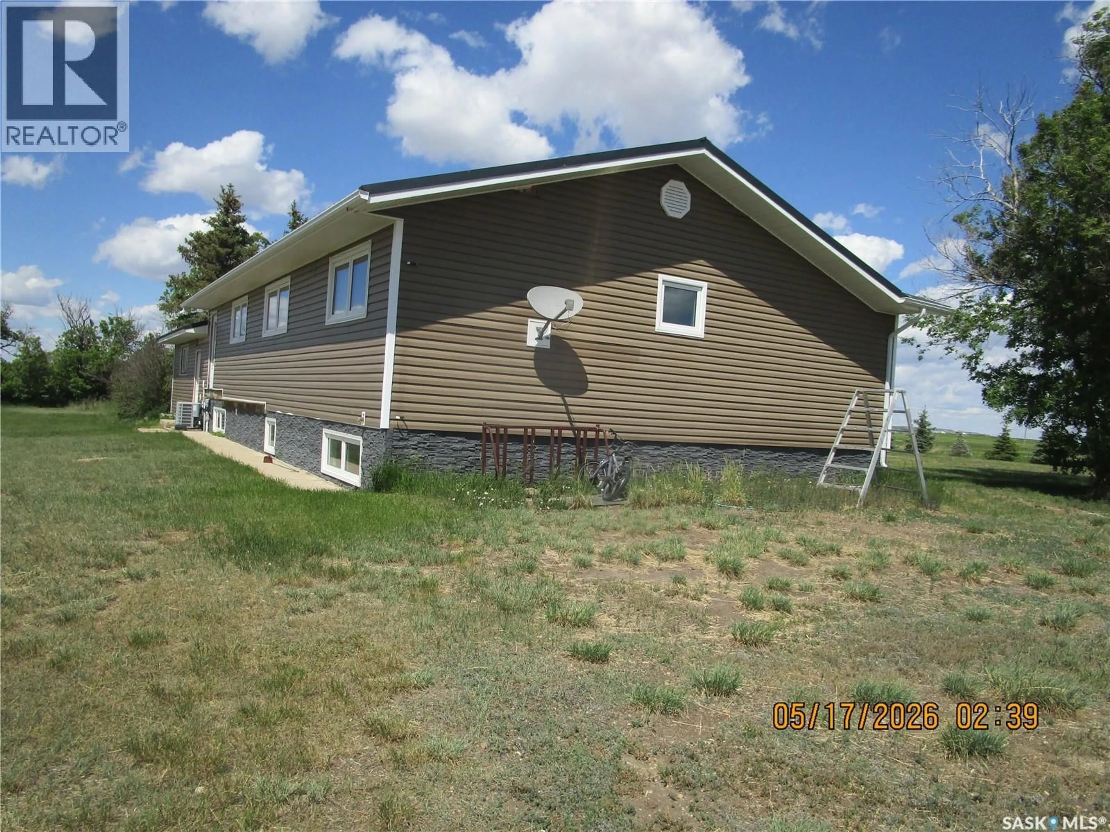 Home with vinyl exterior material, building for MONTEYNE ACREAGE, Poplar Valley Rm No. 12 Saskatchewan S0H0Z0