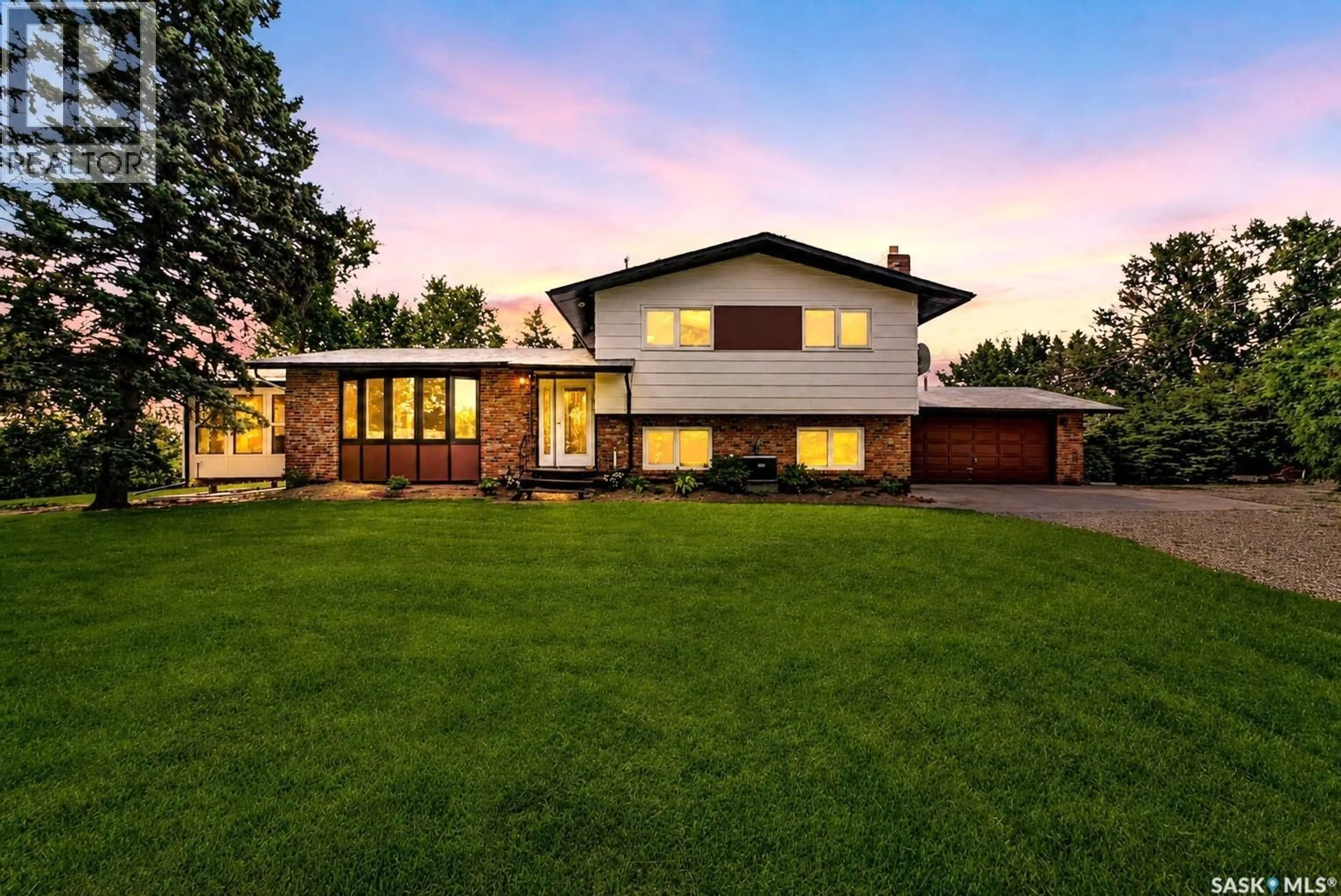 Home with brick exterior material, street for WHISPERING WATERS ACREAGE, St. Andrews Rm No. 287 Saskatchewan S0L2V0
