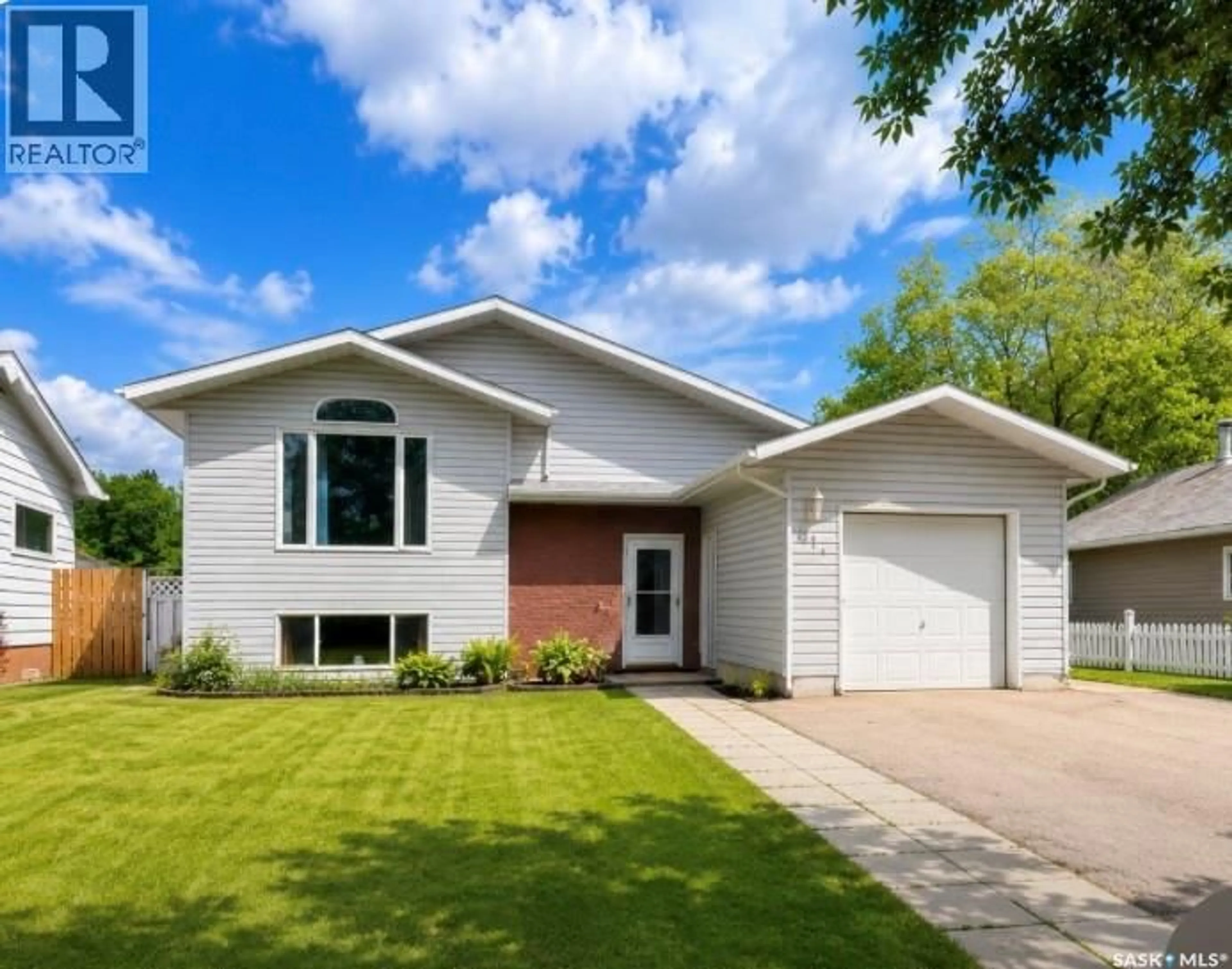 Home with vinyl exterior material, street for 414 1ST STREET, Meadow Lake Saskatchewan S9X1E9