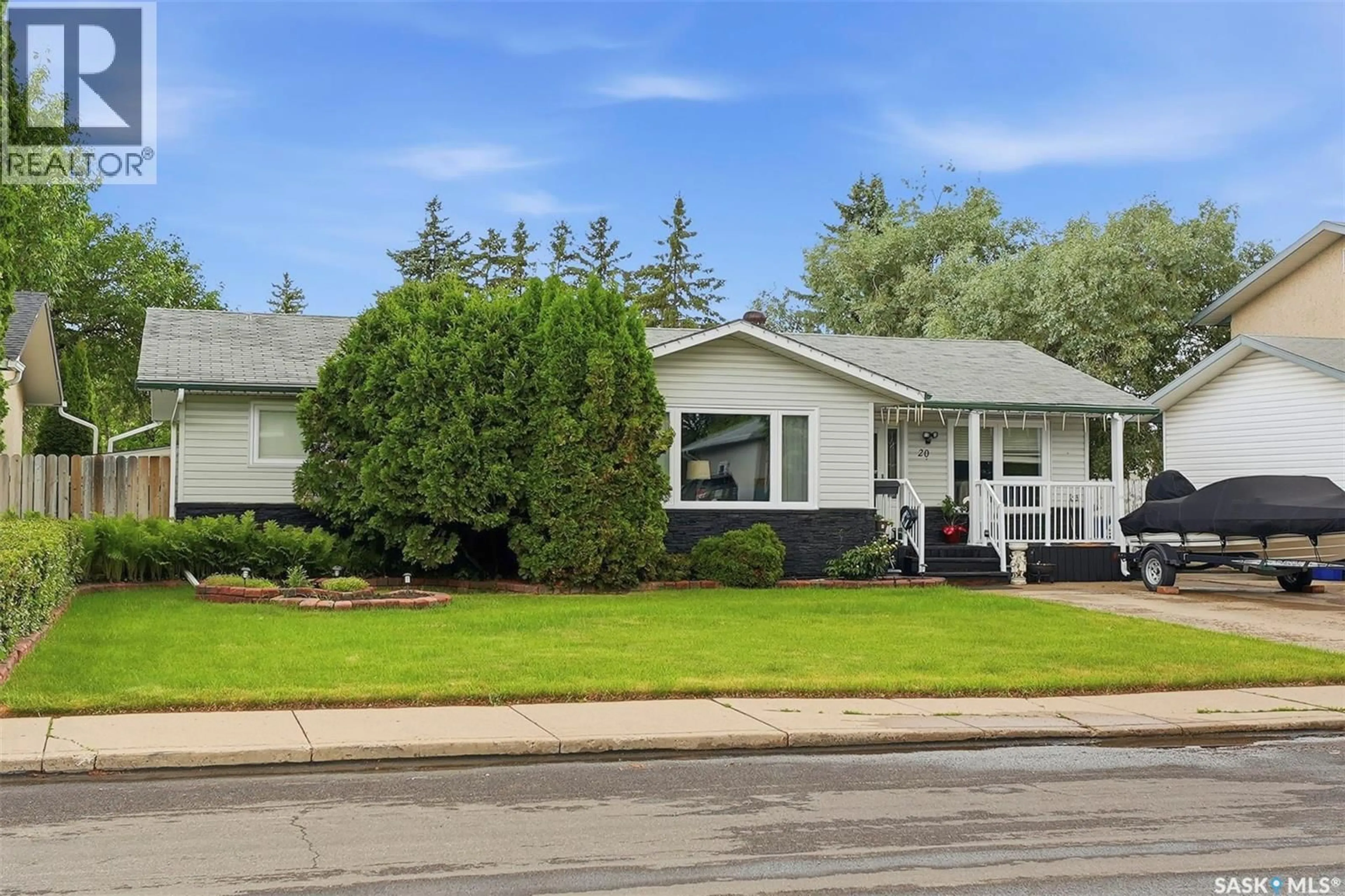 Home with vinyl exterior material, street for 20 CLARK CRESCENT, Saskatoon Saskatchewan S7H3L9