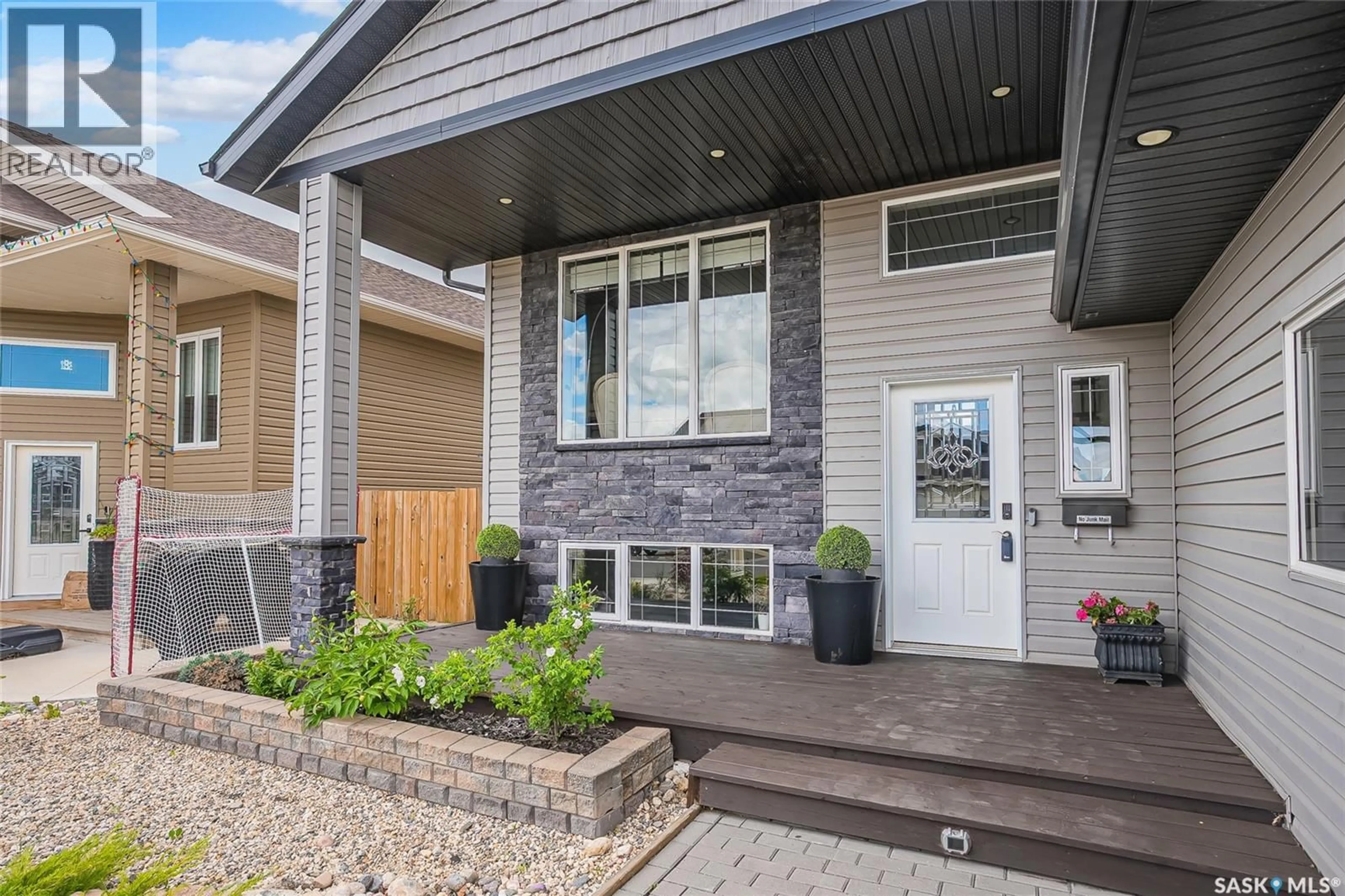 Home with brick exterior material, street for 509 CHERRY LANE, Warman Saskatchewan S0K4S2