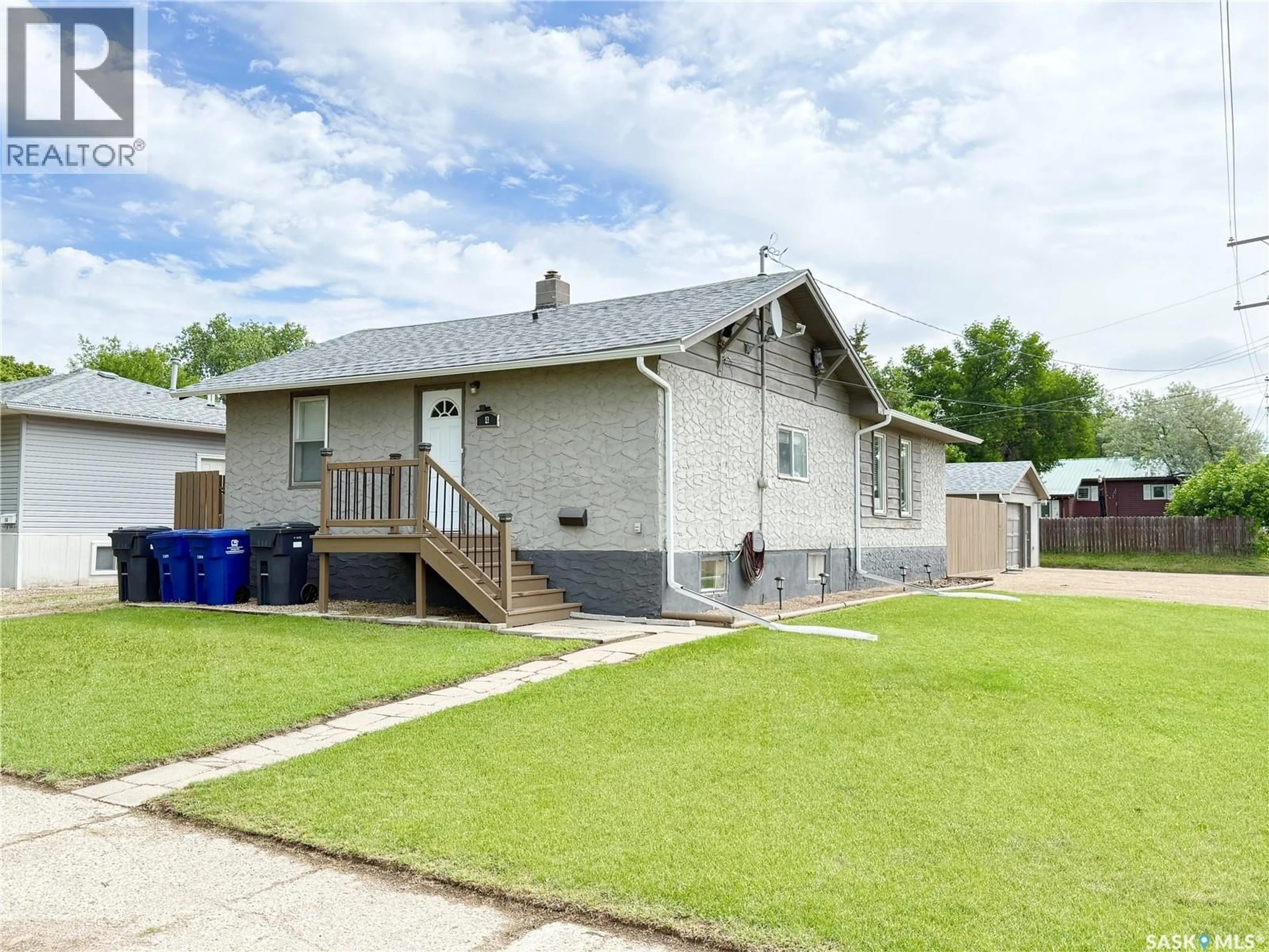 A pic from outside/outdoor area/front of a property/back of a property/a pic from drone, street for 4 9TH STREET, Weyburn Saskatchewan S4H1E5