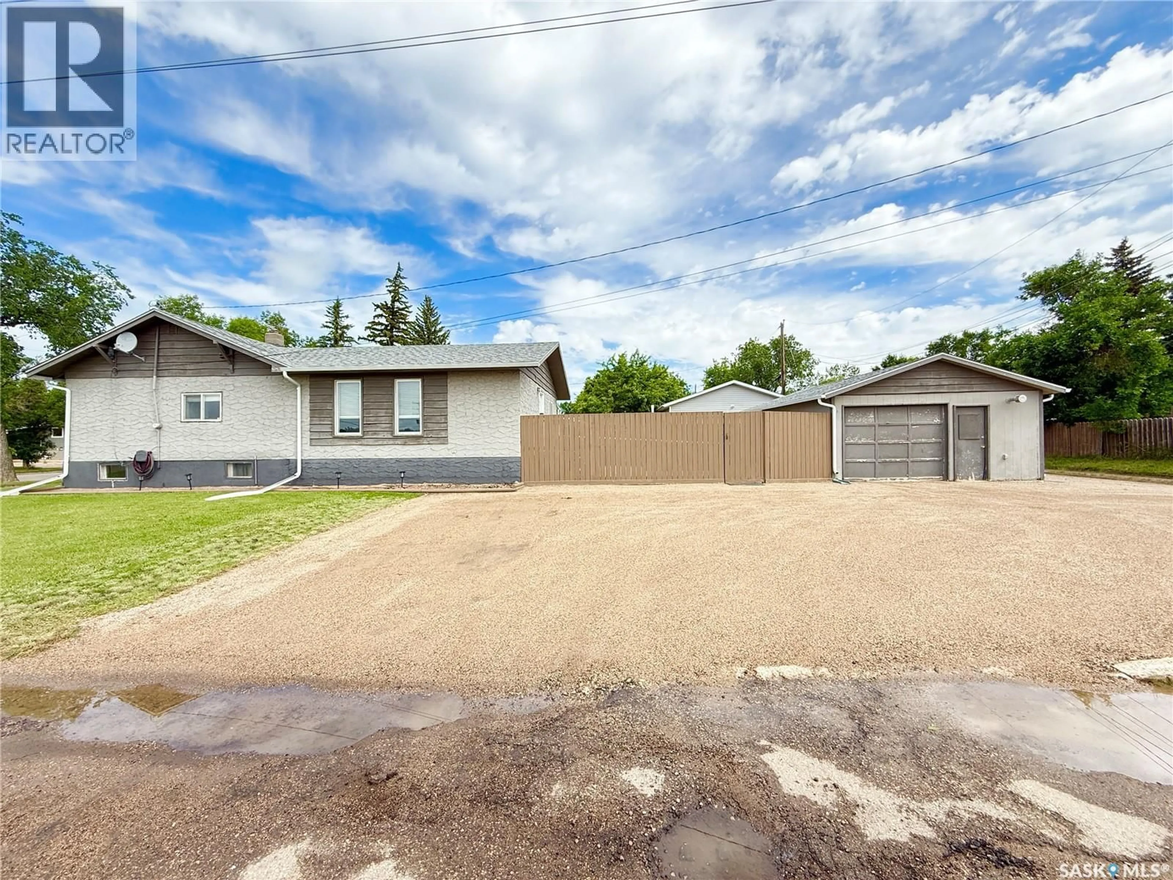 A pic from outside/outdoor area/front of a property/back of a property/a pic from drone, street for 4 9TH STREET, Weyburn Saskatchewan S4H1E5