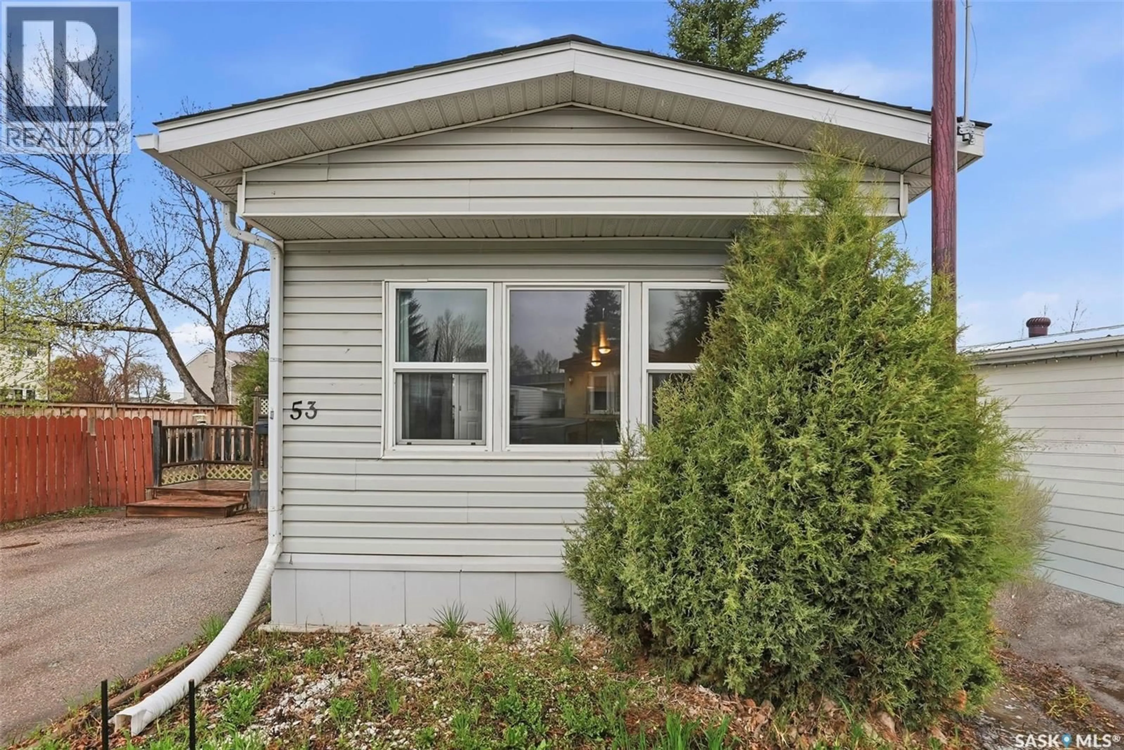 Home with vinyl exterior material, street for 219 - 53 GRANT STREET, Saskatoon Saskatchewan S7N2A5