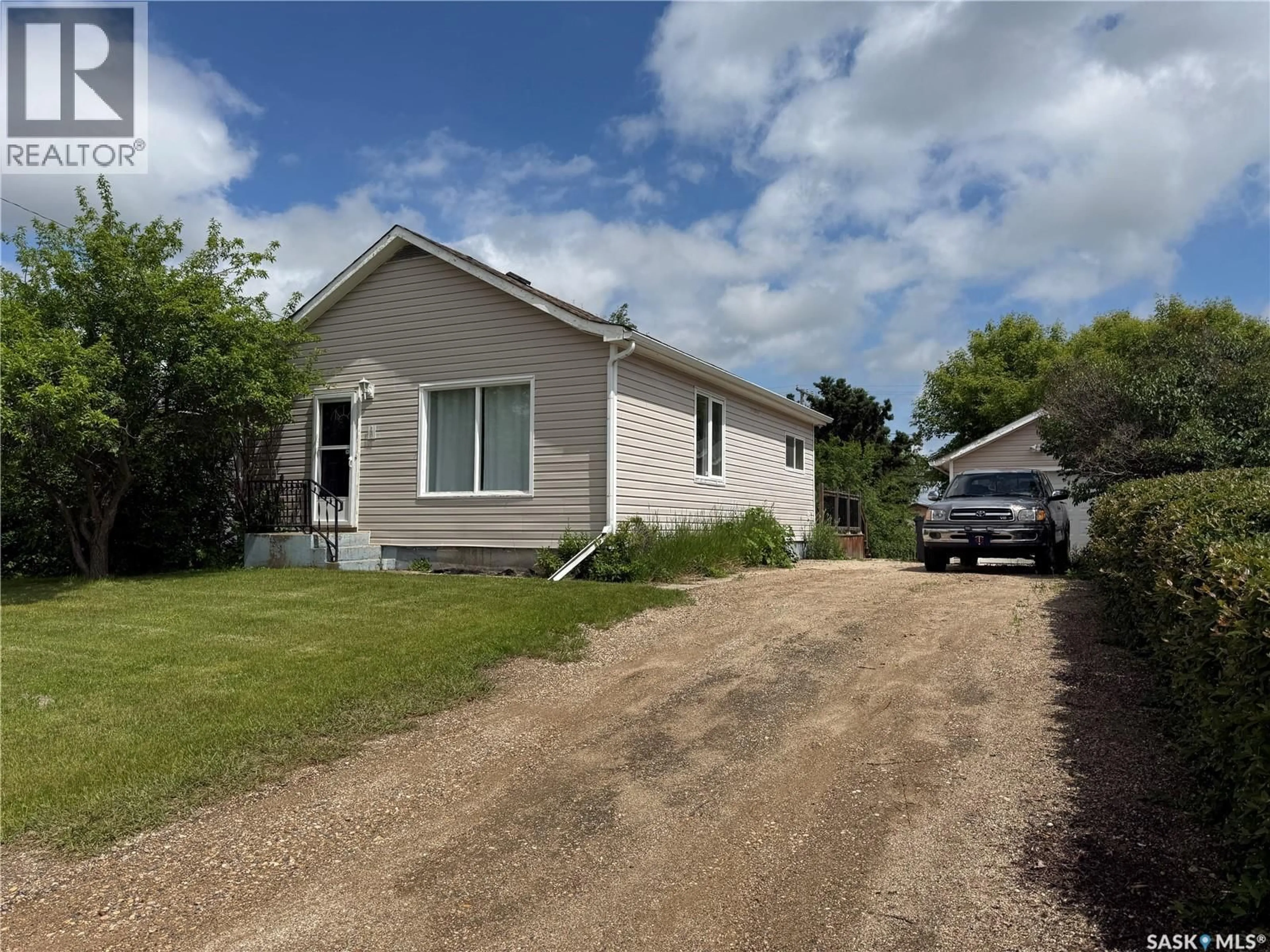 A pic from outside/outdoor area/front of a property/back of a property/a pic from drone, street for 390 ALBERTA STREET, Melville Saskatchewan S0A2P0