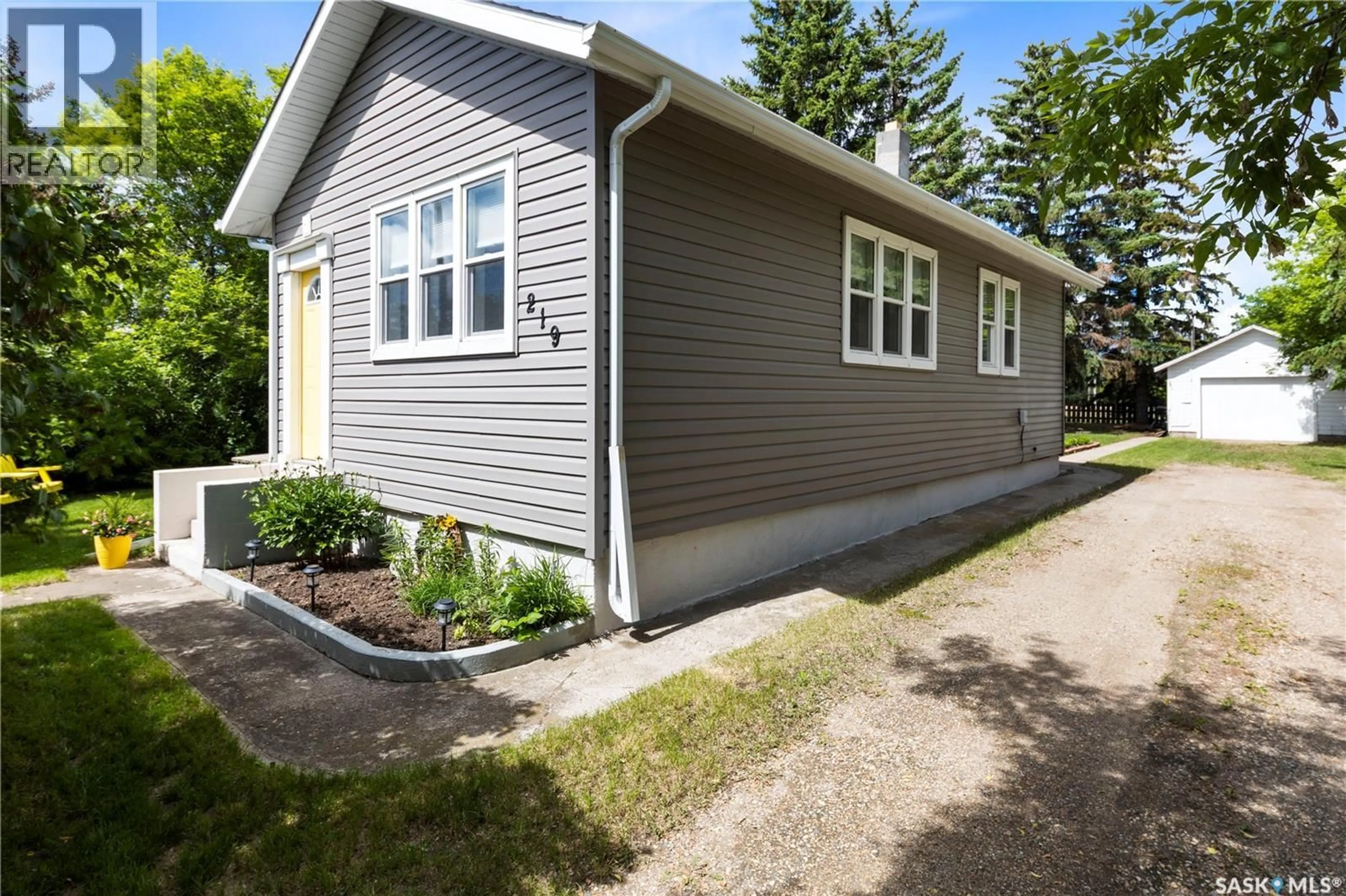 Home with vinyl exterior material, street for 219 MARGARET STREET, Bulyea Saskatchewan S0G0L0