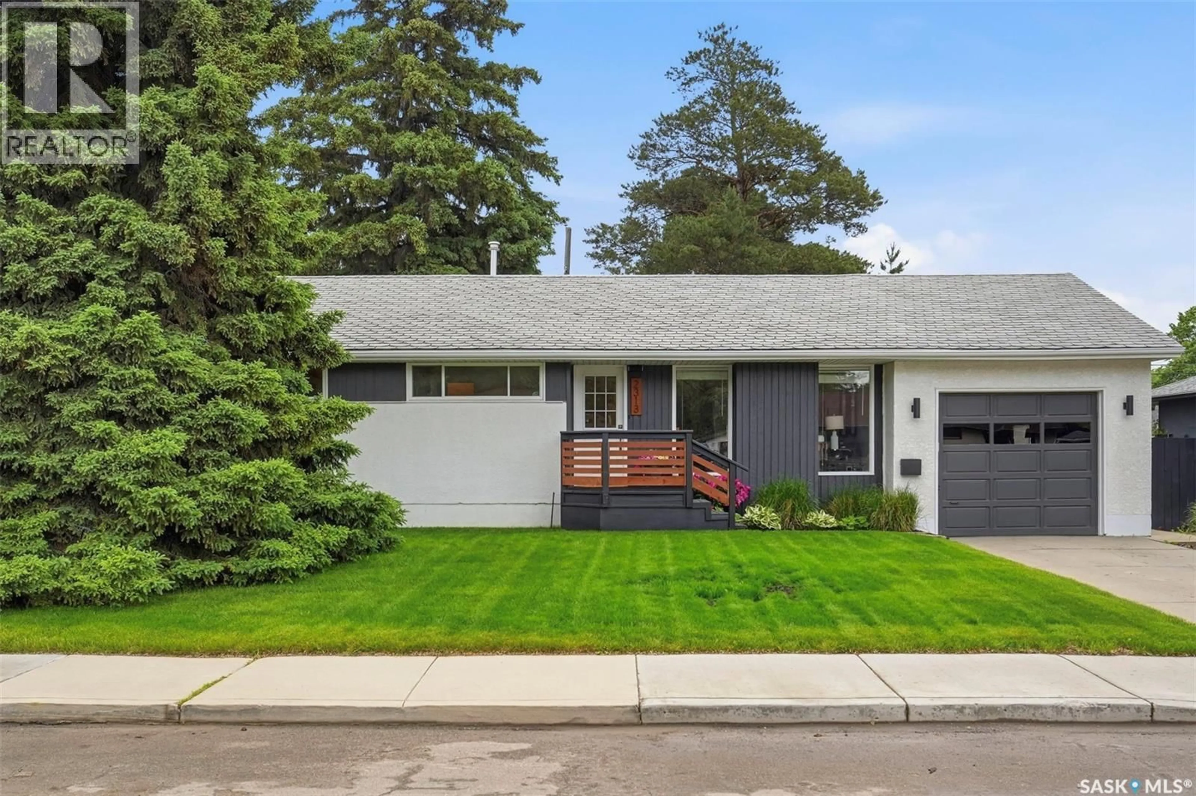 Home with vinyl exterior material, street for 2313 DUFFERIN AVENUE, Saskatoon Saskatchewan S7J1C1