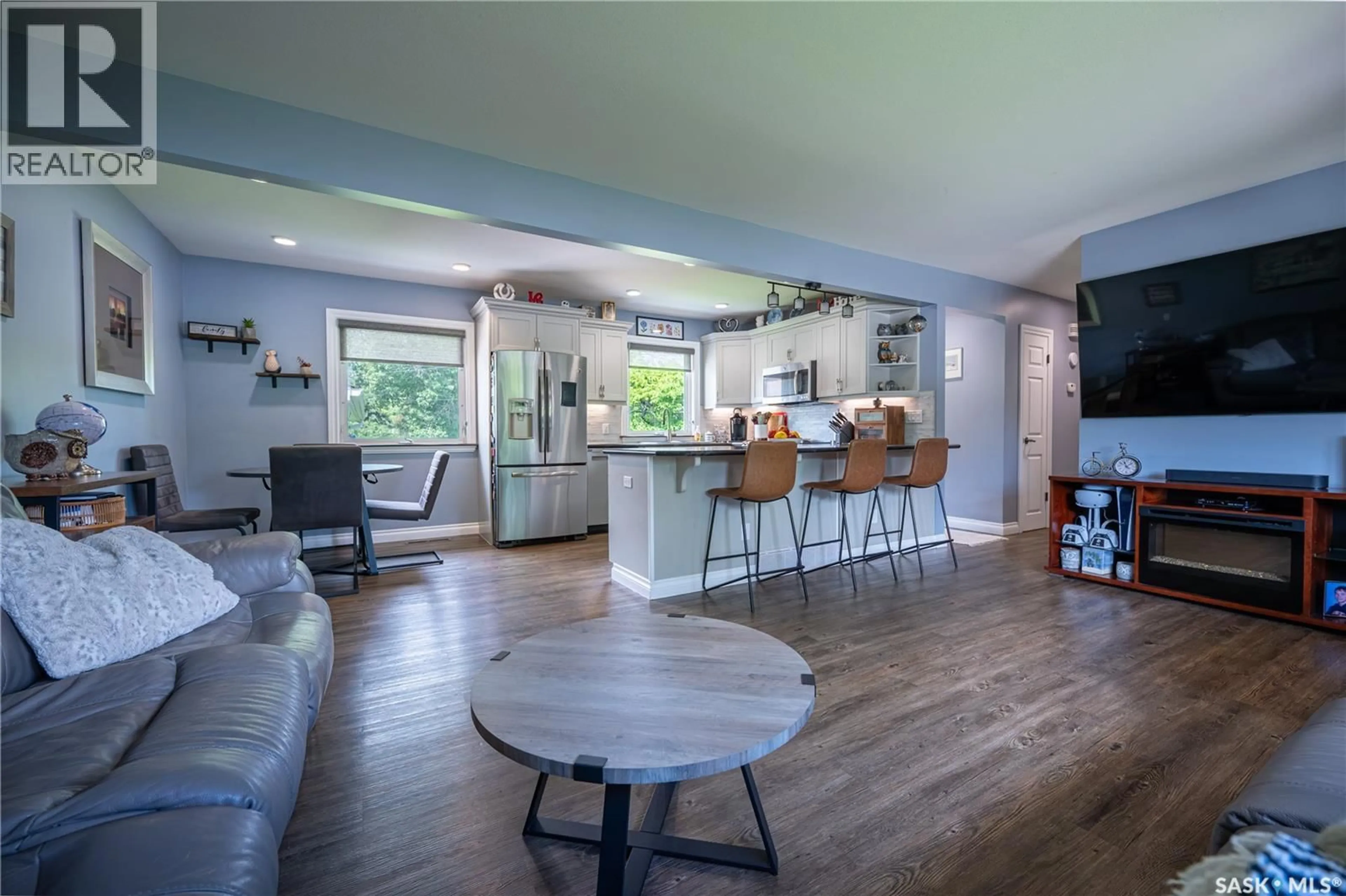 Open concept kitchen, wood/laminate floor for 32 VICTOR PLACE, Yorkton Saskatchewan S3N2H4