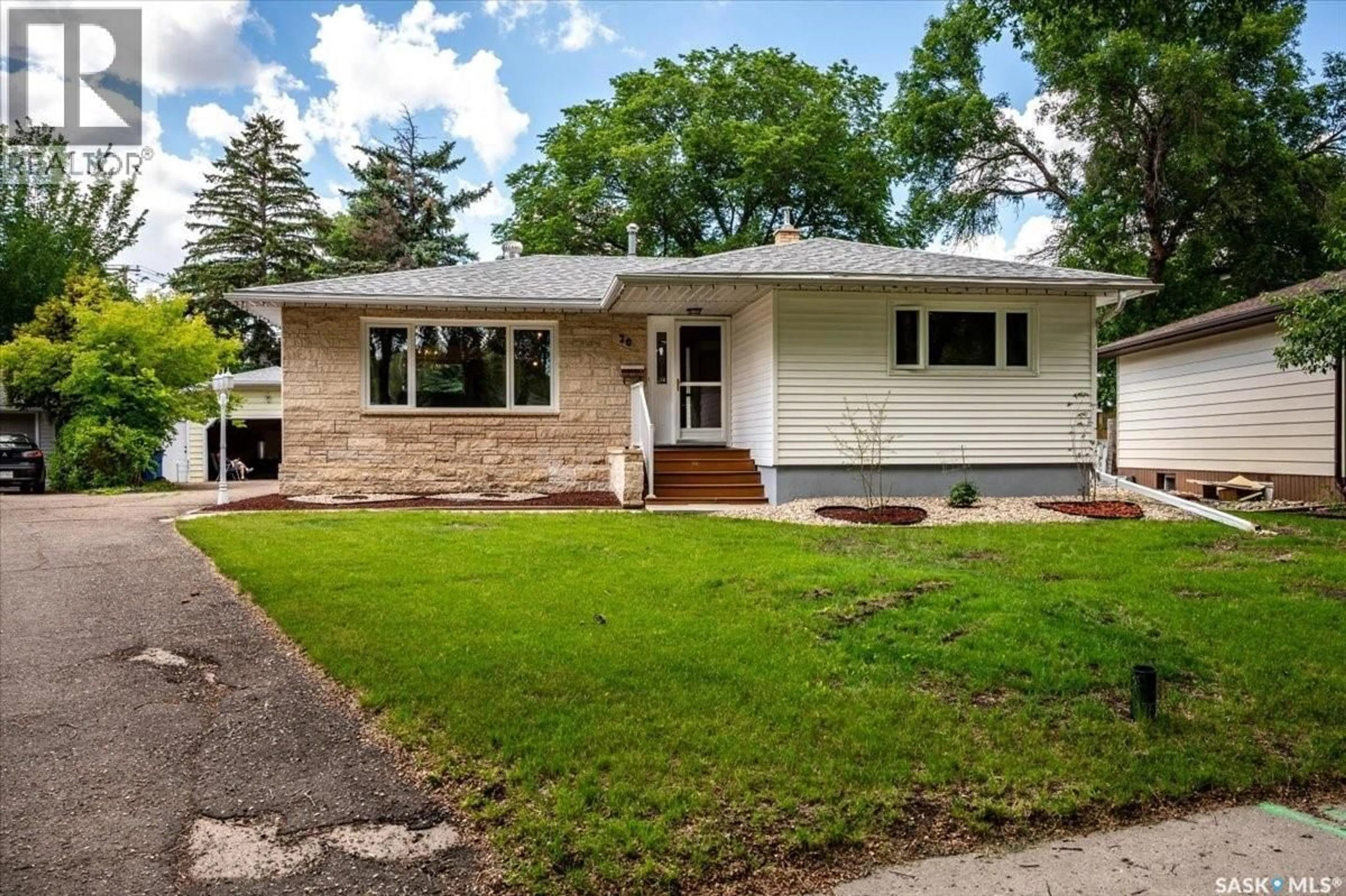 Home with vinyl exterior material, street for 20 DUNNING CRESCENT, Regina Saskatchewan S4S3W1