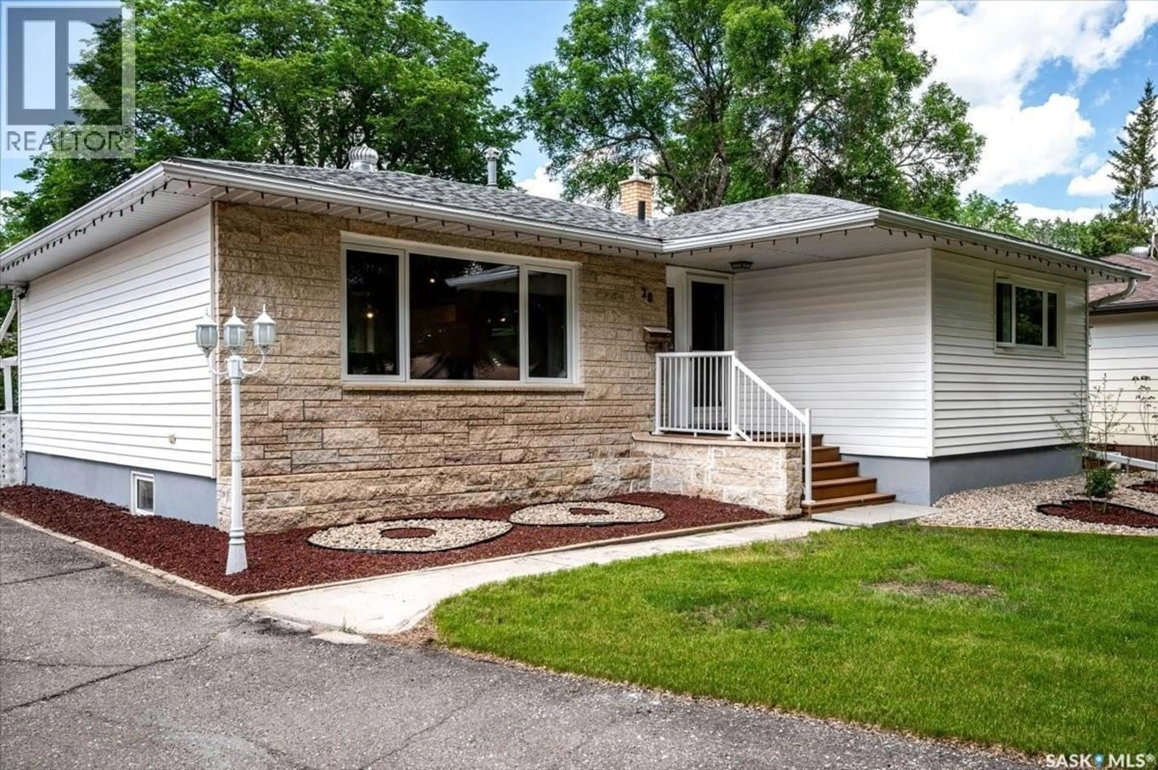 Home with vinyl exterior material, street for 20 DUNNING CRESCENT, Regina Saskatchewan S4S3W1